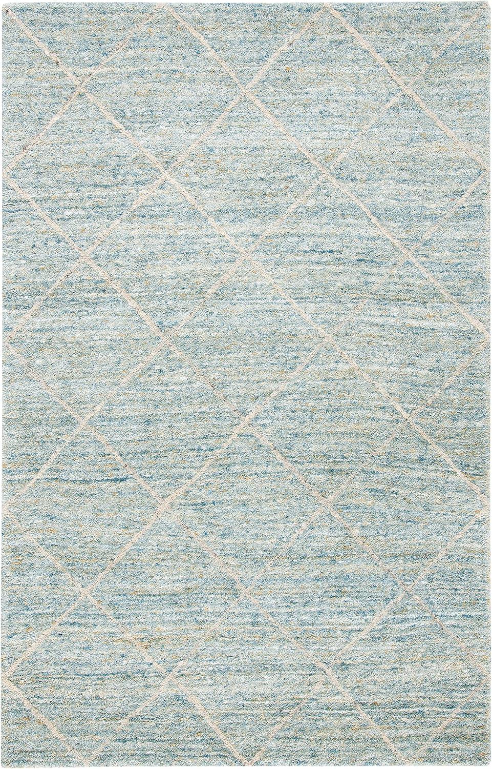 Hand-loomed Tranquility Blue Round Wool Area Rug - 59"