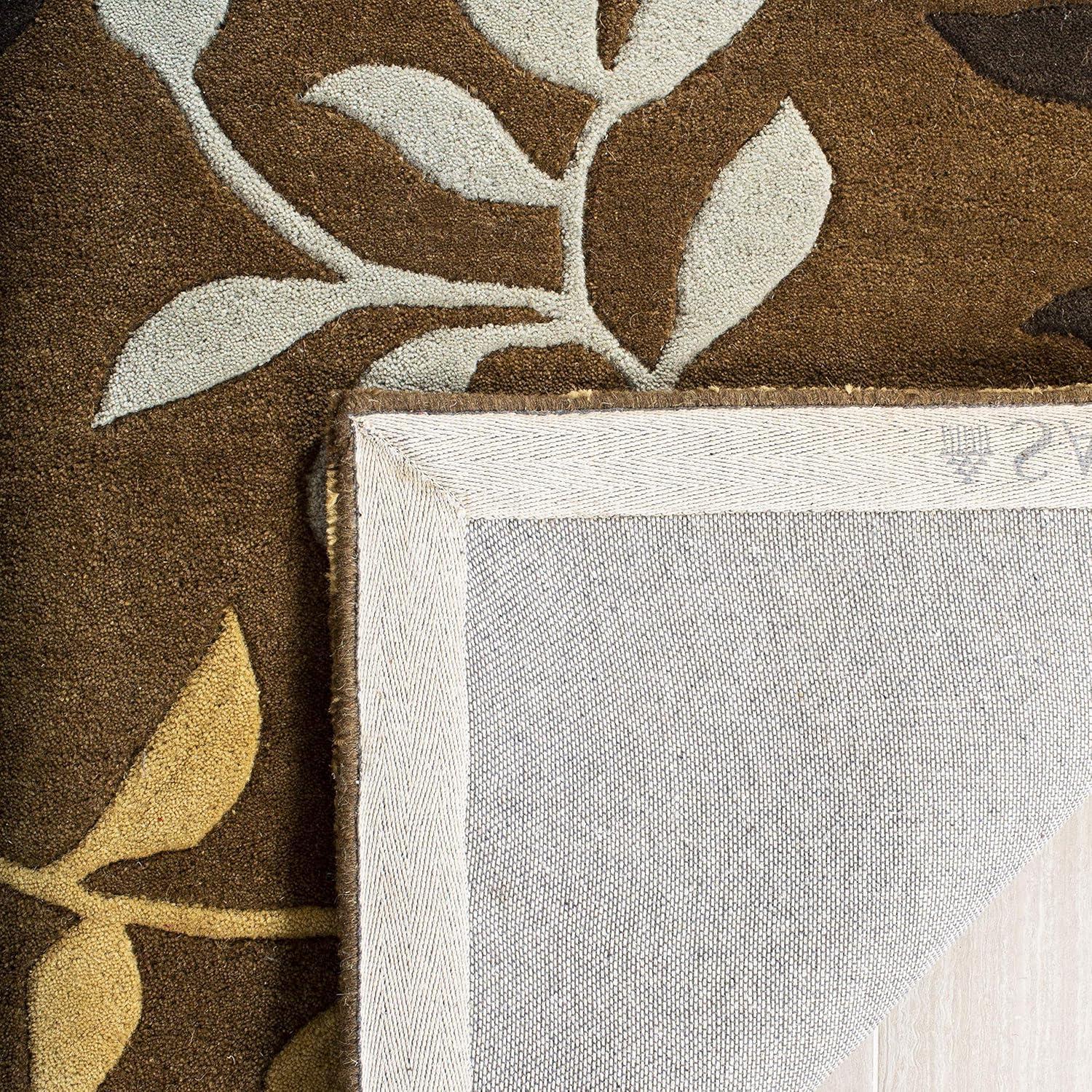 Soho SOH833 Hand Tufted Indoor Area Rug - Brown/Multi - 6' round - Safavieh.