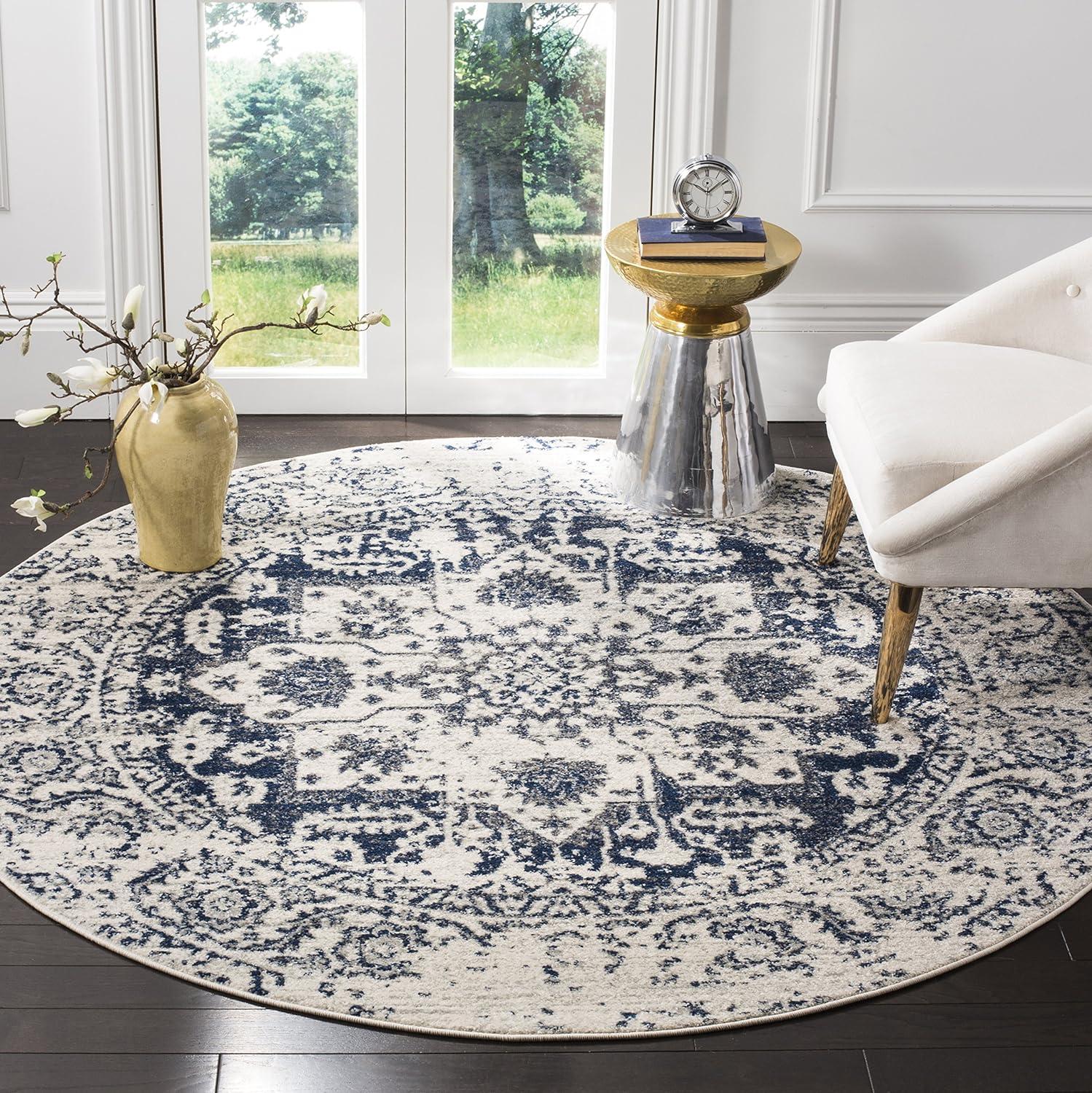 Ivory and Navy Synthetic 3' Round Reversible Area Rug