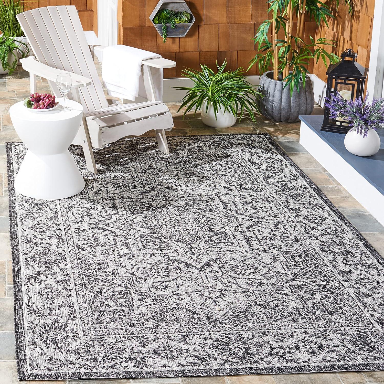 Courtyard Round Non-Slip Gray Synthetic Area Rug, 6'7" x 9'6"