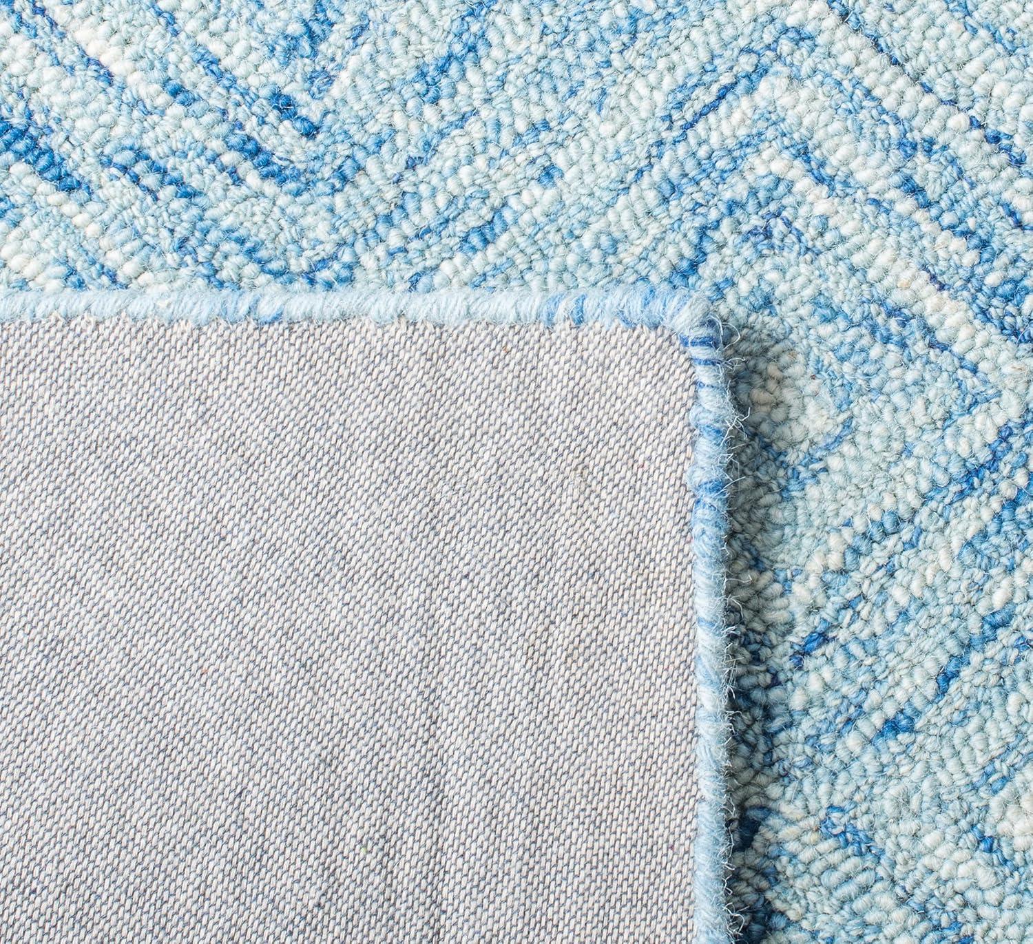 Ikat IKT704 Hand Tufted Area Rug - Blue - 4'x6' - Safavieh.
