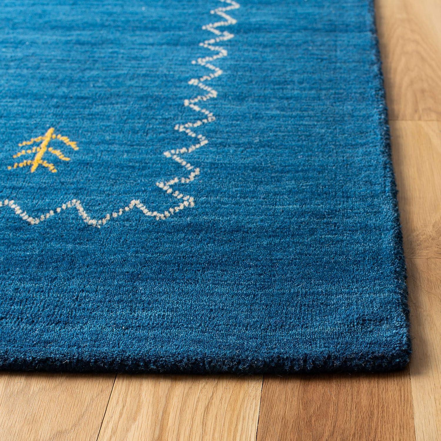 SAFAVIEH Himalaya Yvonne Solid Wool Area Rug, Blue, 11' x 15'