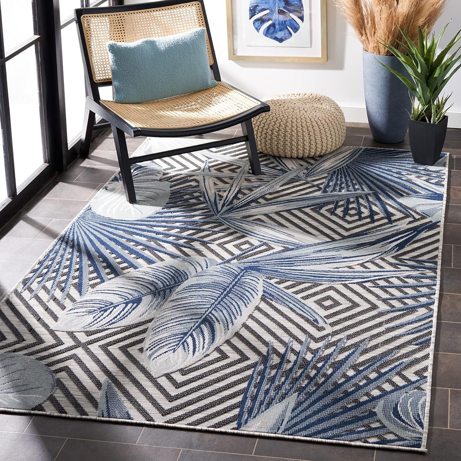 Ivory and Navy Geometric Synthetic 4' x 6' Area Rug