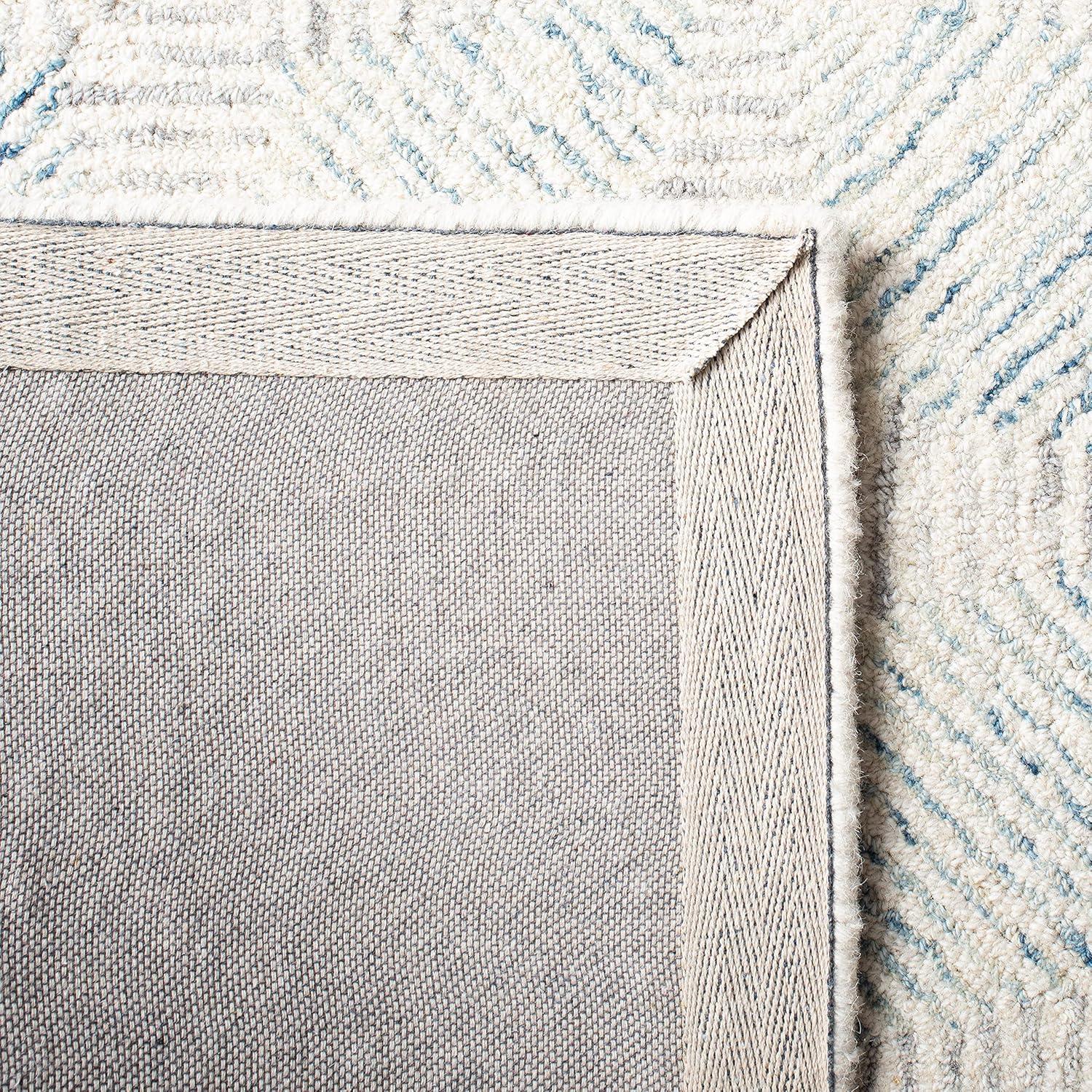 Abstract ABT654 Hand Tufted Area Rug - Ivory/Light Blue - 8'x10' - Safavieh.