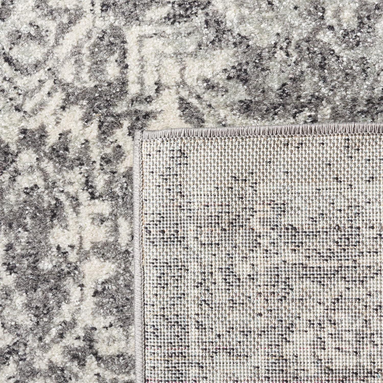 Transitional Grey & Ivory Synthetic 6'7" x 9' Area Rug