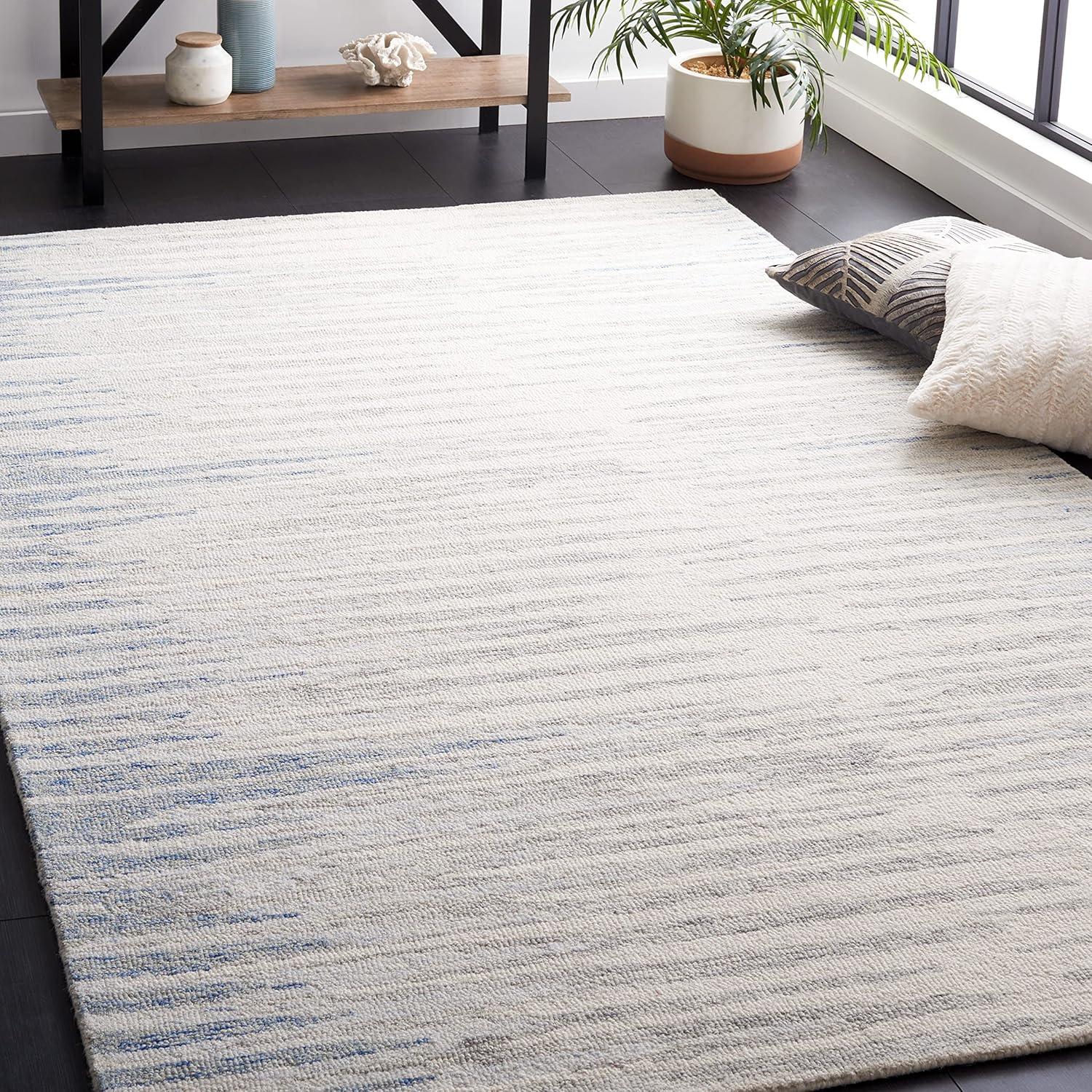 Handmade Abstract Ivory and Light Blue Wool Area Rug, 4' x 6'