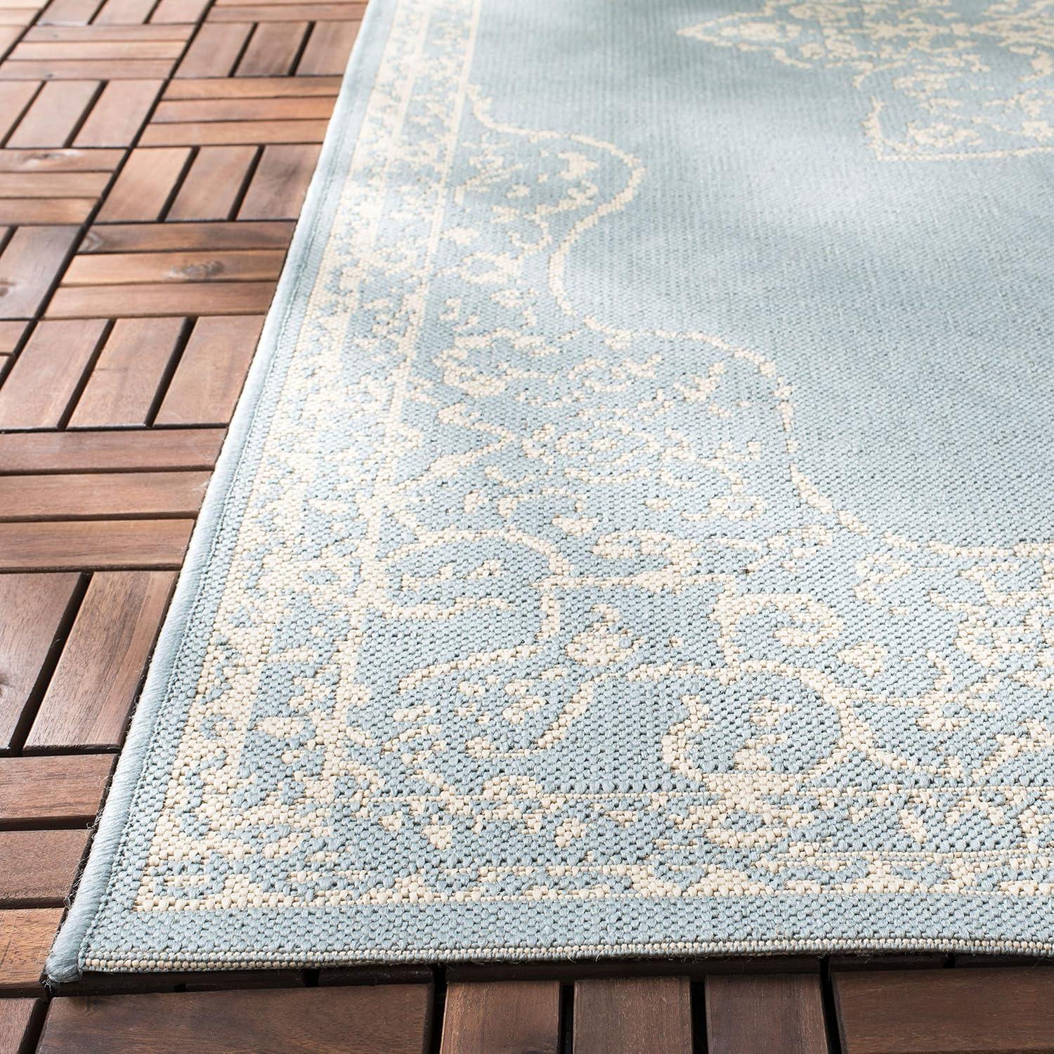 Cream and Aqua Medallion 9' x 12' Reversible Synthetic Area Rug