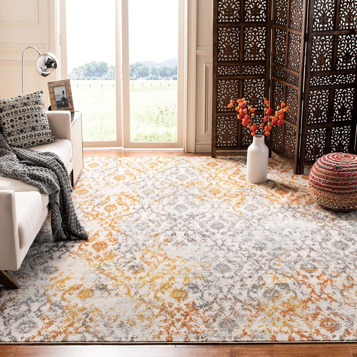 Ivory and Orange Synthetic 6' x 9' Damask Area Rug