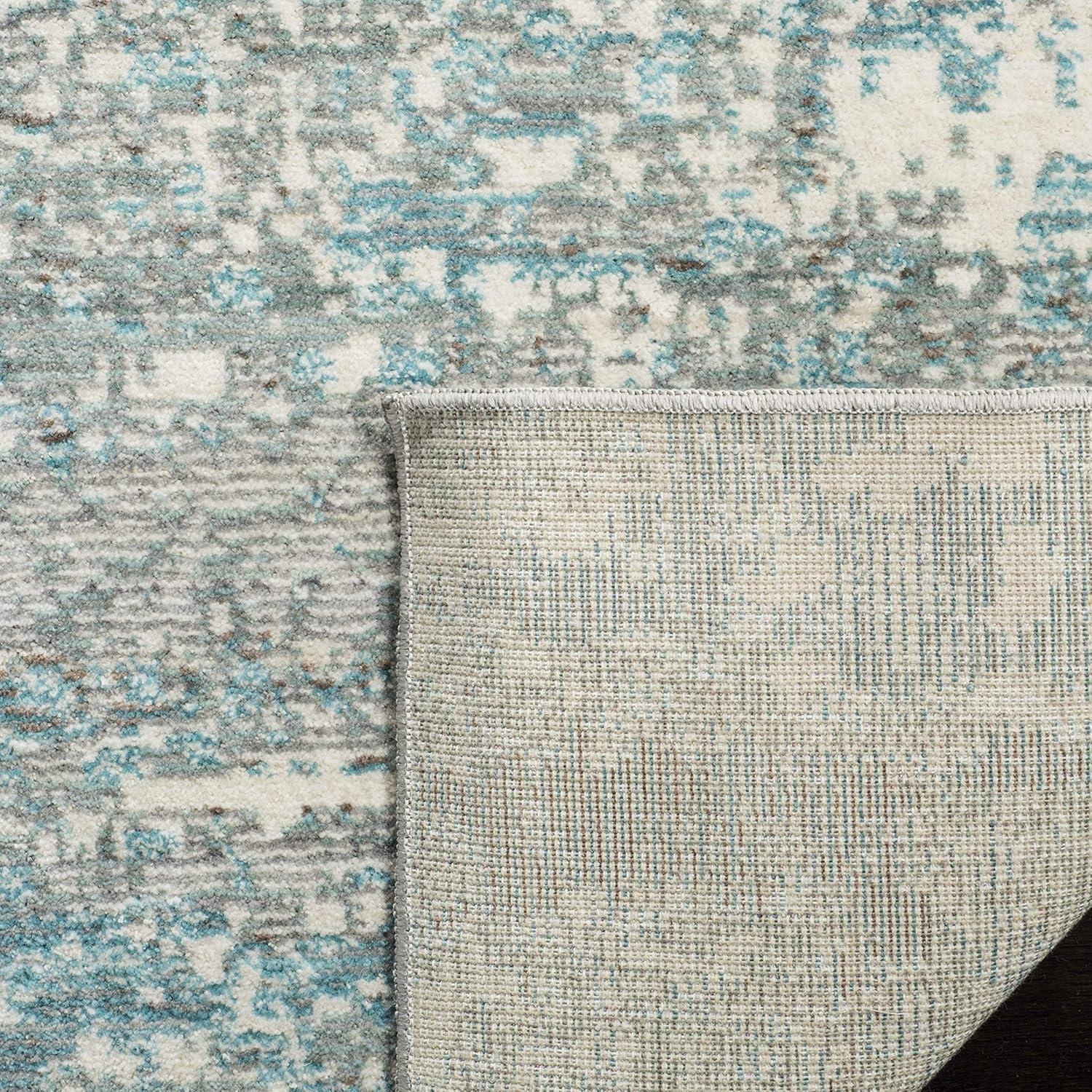 Mystique MYS971 Power Loomed Area Rug Teal / Multi 4' X 6' - Safavieh.