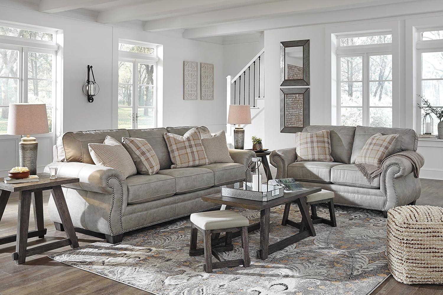 Elegant Gray Faux Leather Loveseat with Nailhead Trim & Plaid Pillows