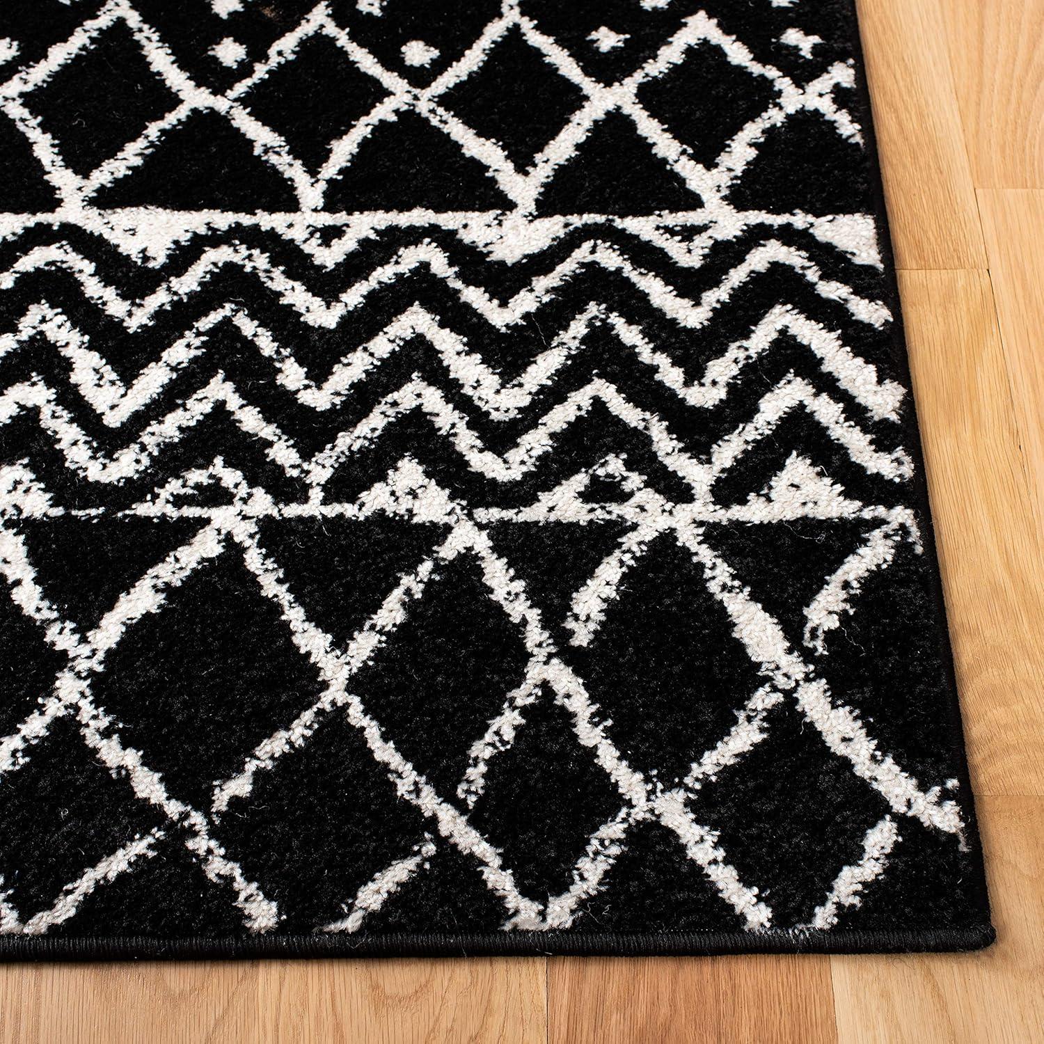 Boho-Chic Black and Ivory Moroccan-Inspired 2' x 5' Synthetic Area Rug