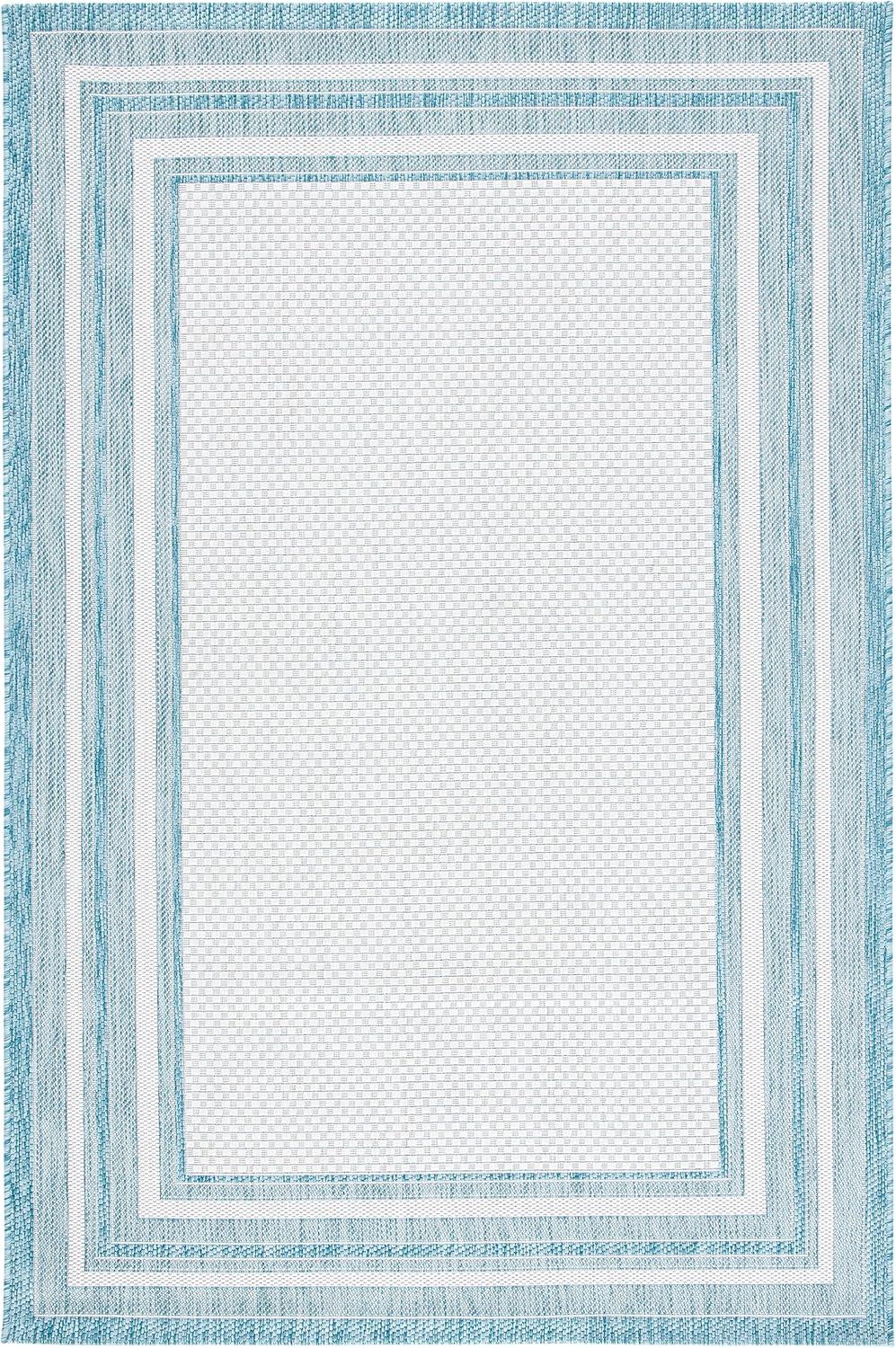 Ivory and Aqua Rectangular Reversible 9' x 12' Easy-Care Area Rug