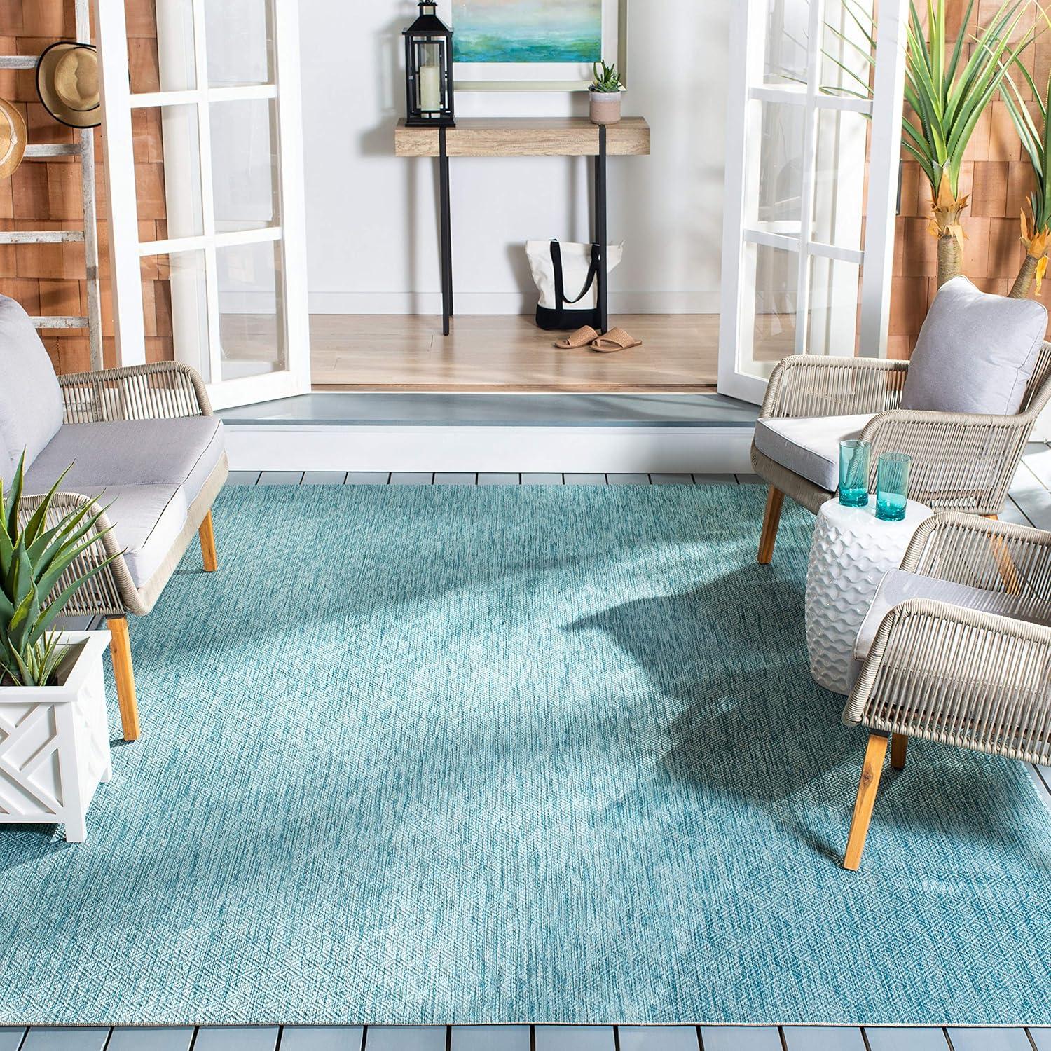 Aqua Delano Easy-Care 6'7" x 9'6" Synthetic Indoor/Outdoor Rug