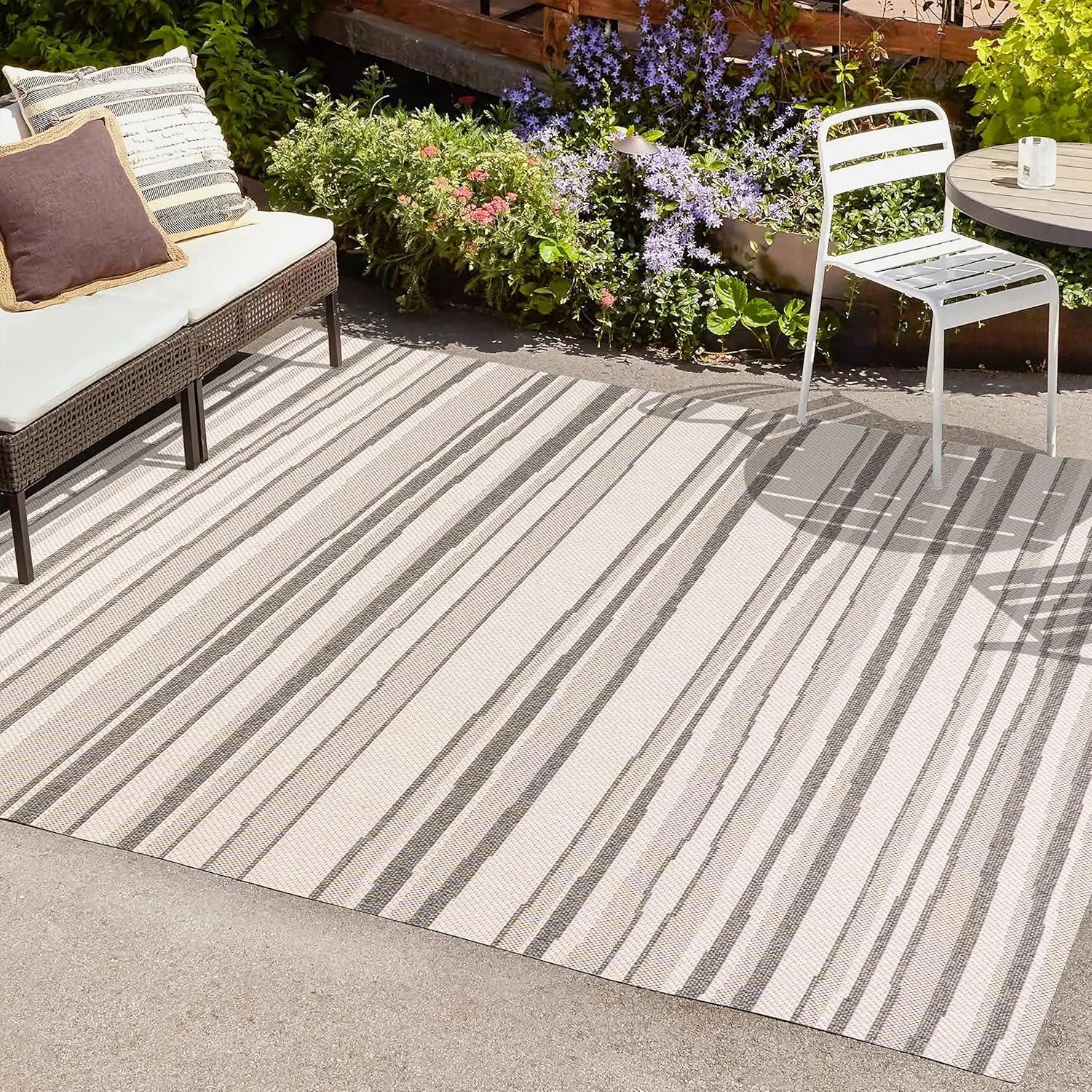 5' x 8' Castara Wavy Stripe Modern Indoor/Outdoor Area Rug, Cream/Dark Gray - JONATHAN Y