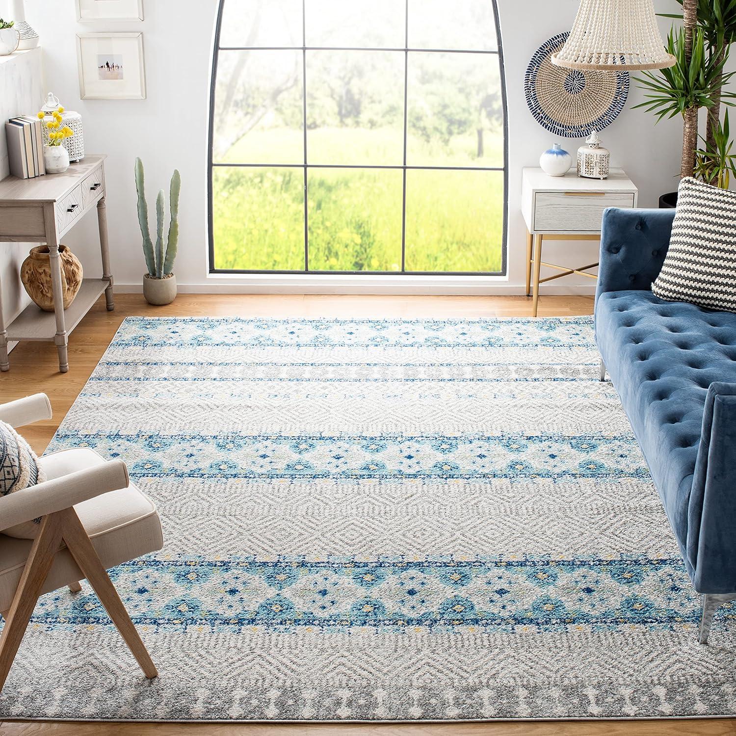 Rectangular 10' x 14' Grey and Turquoise Synthetic Area Rug