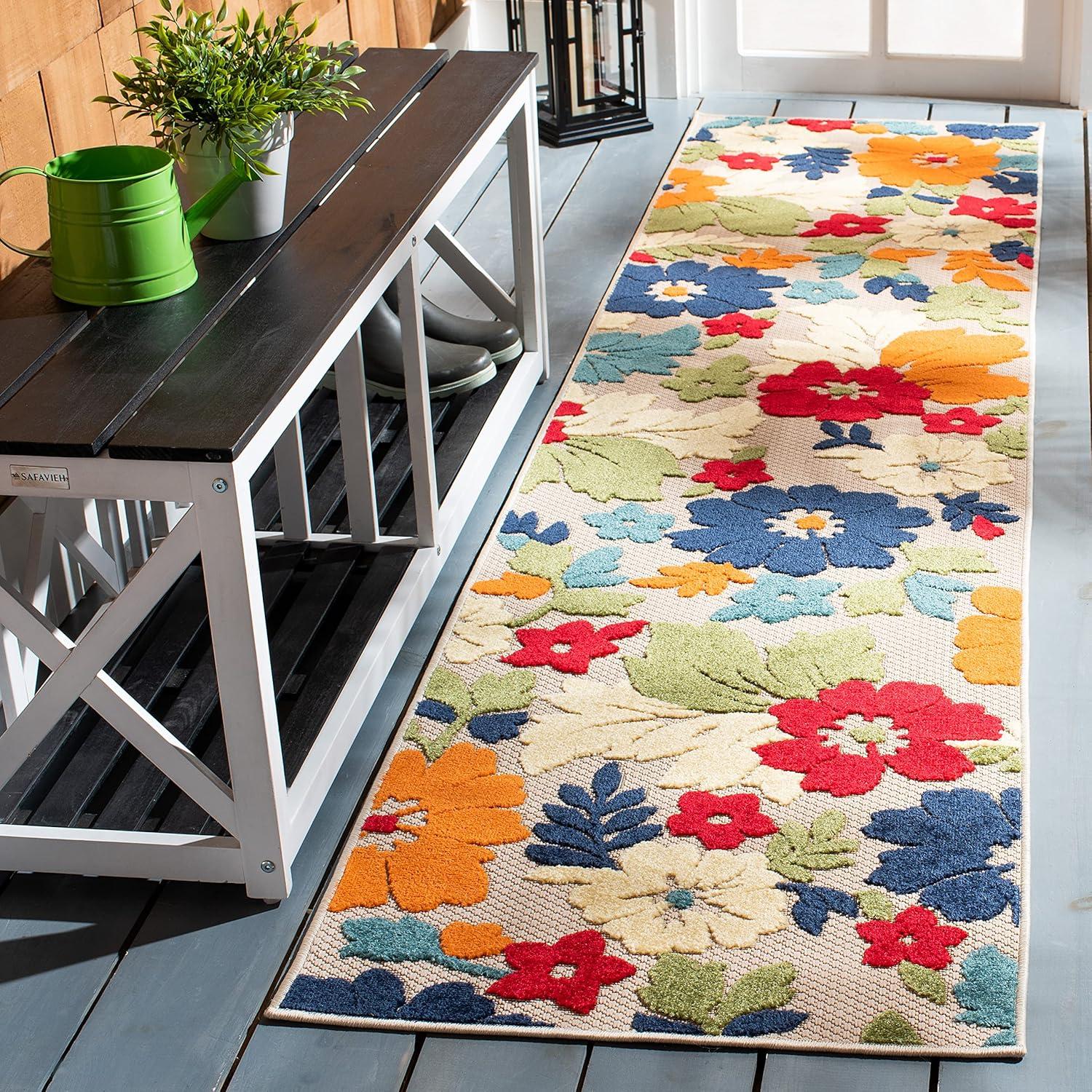 Ivory and Orange Floral Synthetic Outdoor Rug, 26" x 9'