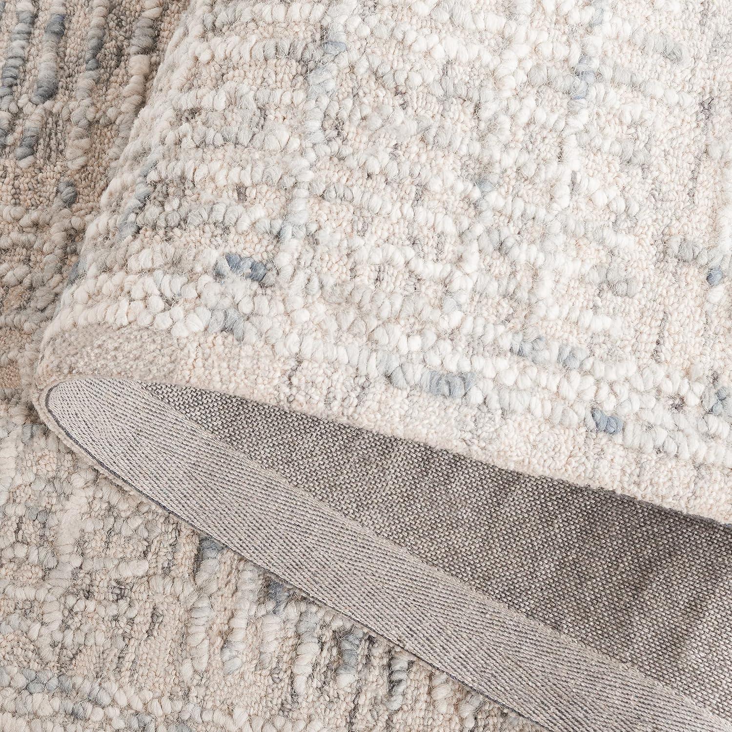 Abstract ABT275 Handmade Tufted Area Rug - Light Blue/Ivory - 5'-0" x 8'-0" - Safavieh