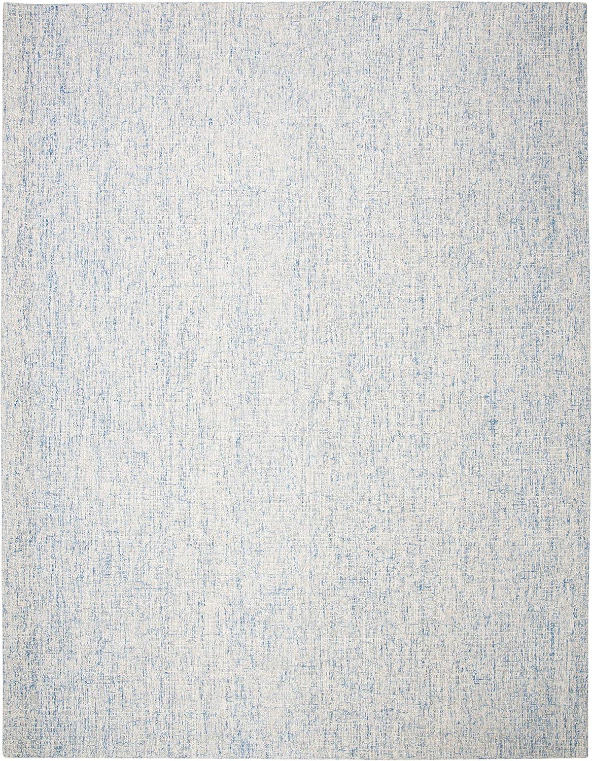 SAFAVIEH Abstract Emely Distressed Wool Area Rug, Ivory/Blue, 9' x 12'