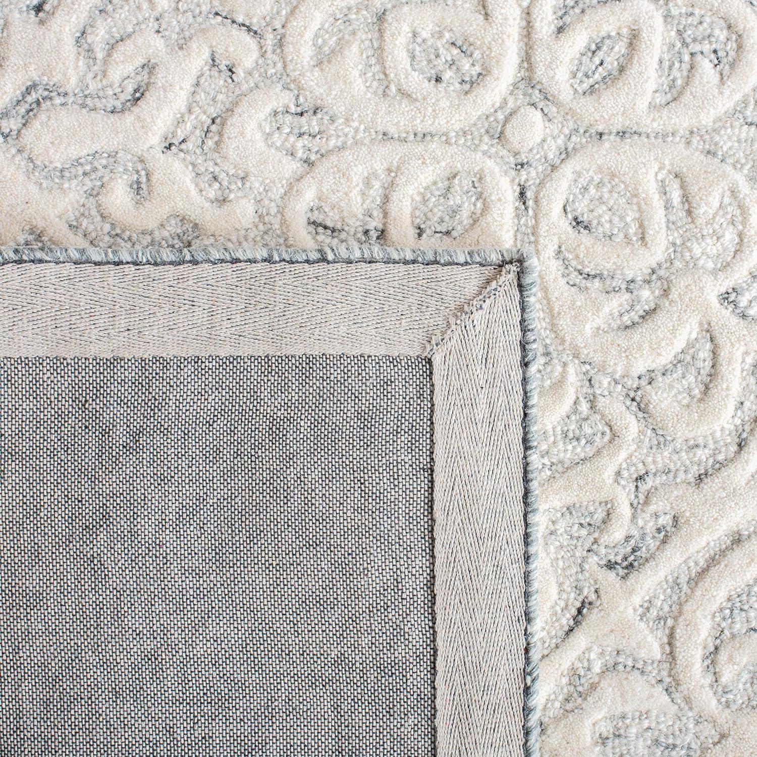 Metro MET857 Hand Tufted Indoor Area Rug - Silver/Ivory - 5'x8' - Safavieh