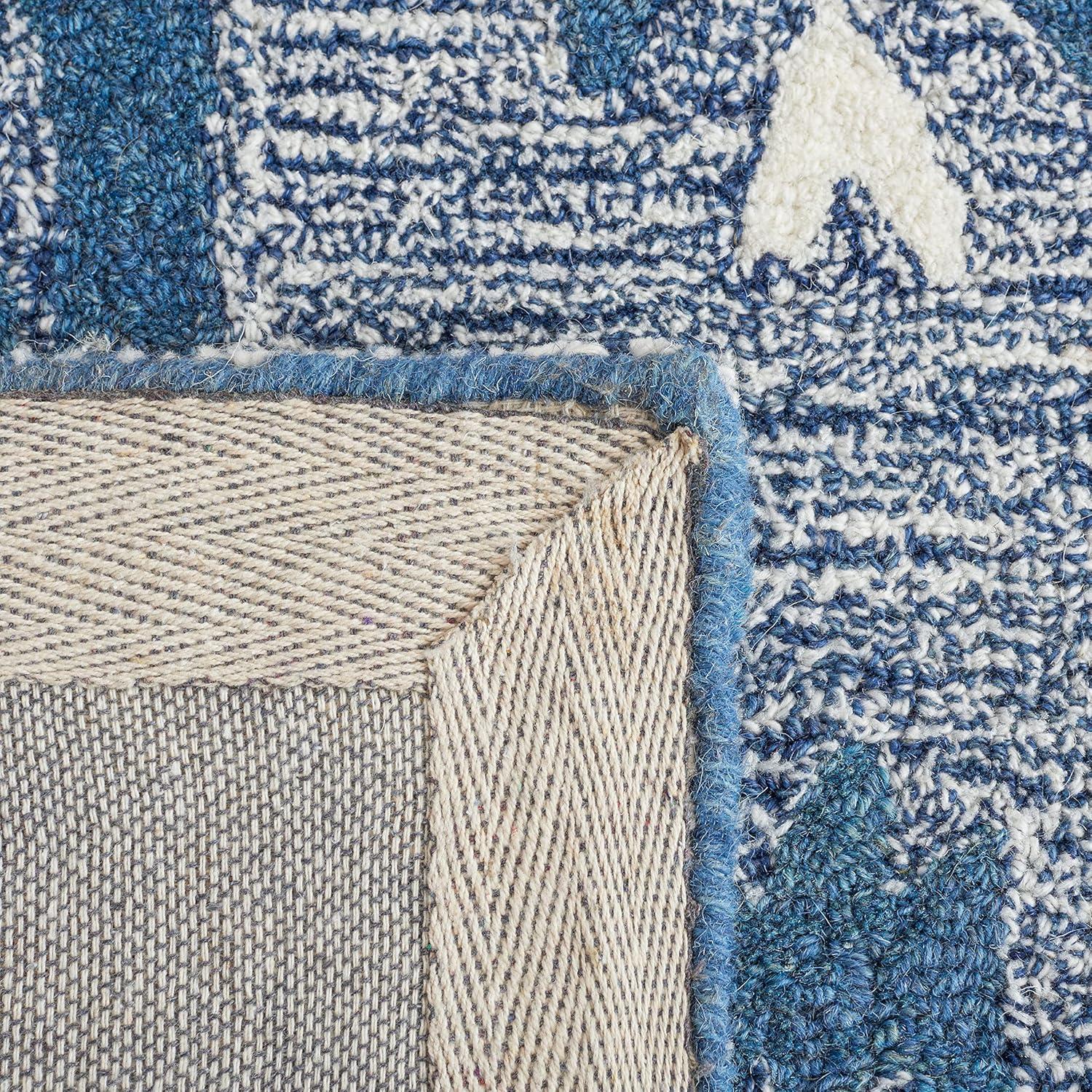 Ikat IKT652 Hand Tufted Area Rug - Blue/Ivory - 8'x10' - Safavieh.