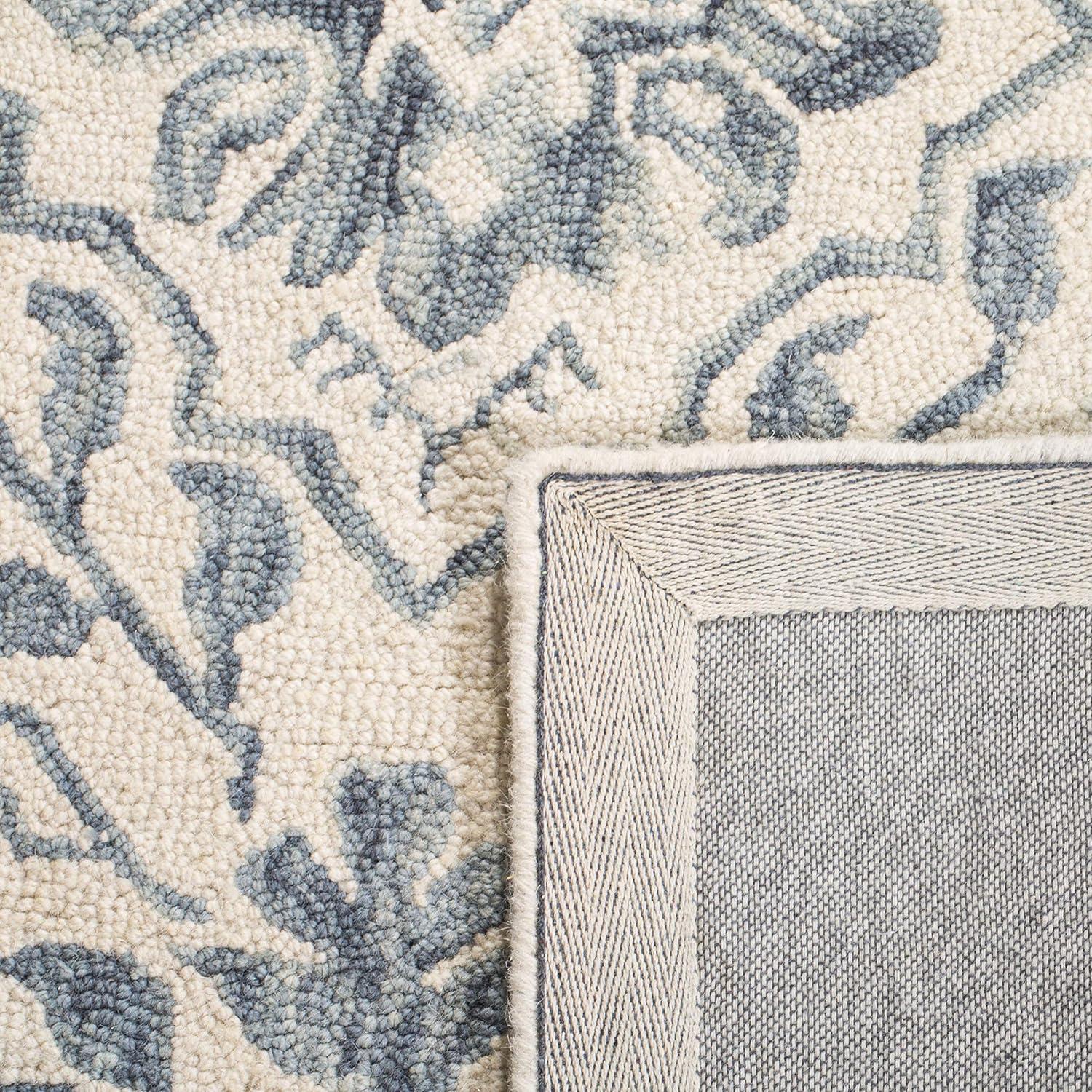 Handmade Light Blue and Ivory Tufted Wool Round Rug
