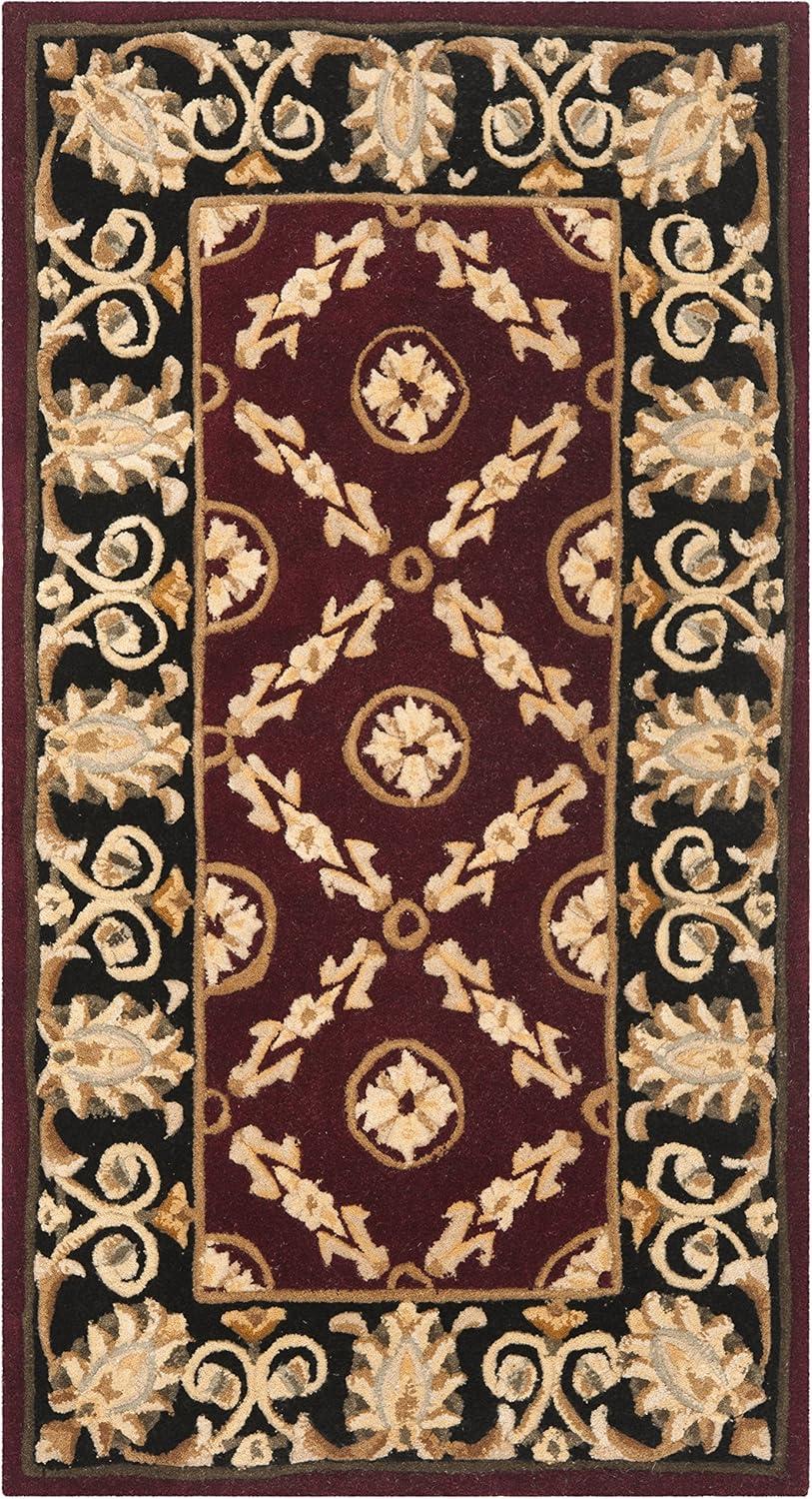 SAFAVIEH Naples Clinton Floral Bordered Wool Area Rug, Burgundy/Black, 2'6" x 4'6"