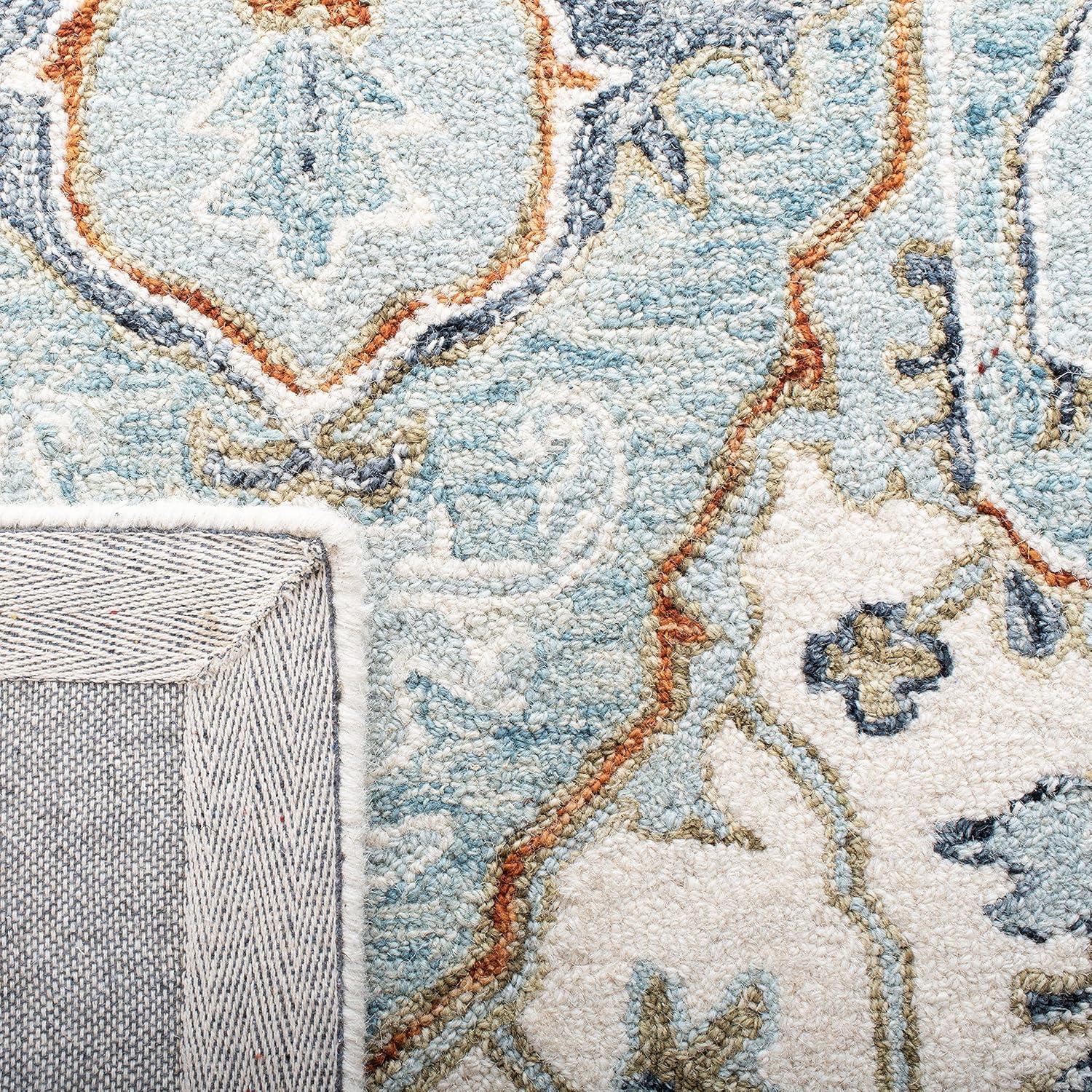 SAFAVIEH Heritage Collection Area Rug - 6' x 9', Ivory & Blue, Handmade Traditional Oriental Wool, Ideal for High Traffic Areas in Living Room, Bedroom (HG922A)
