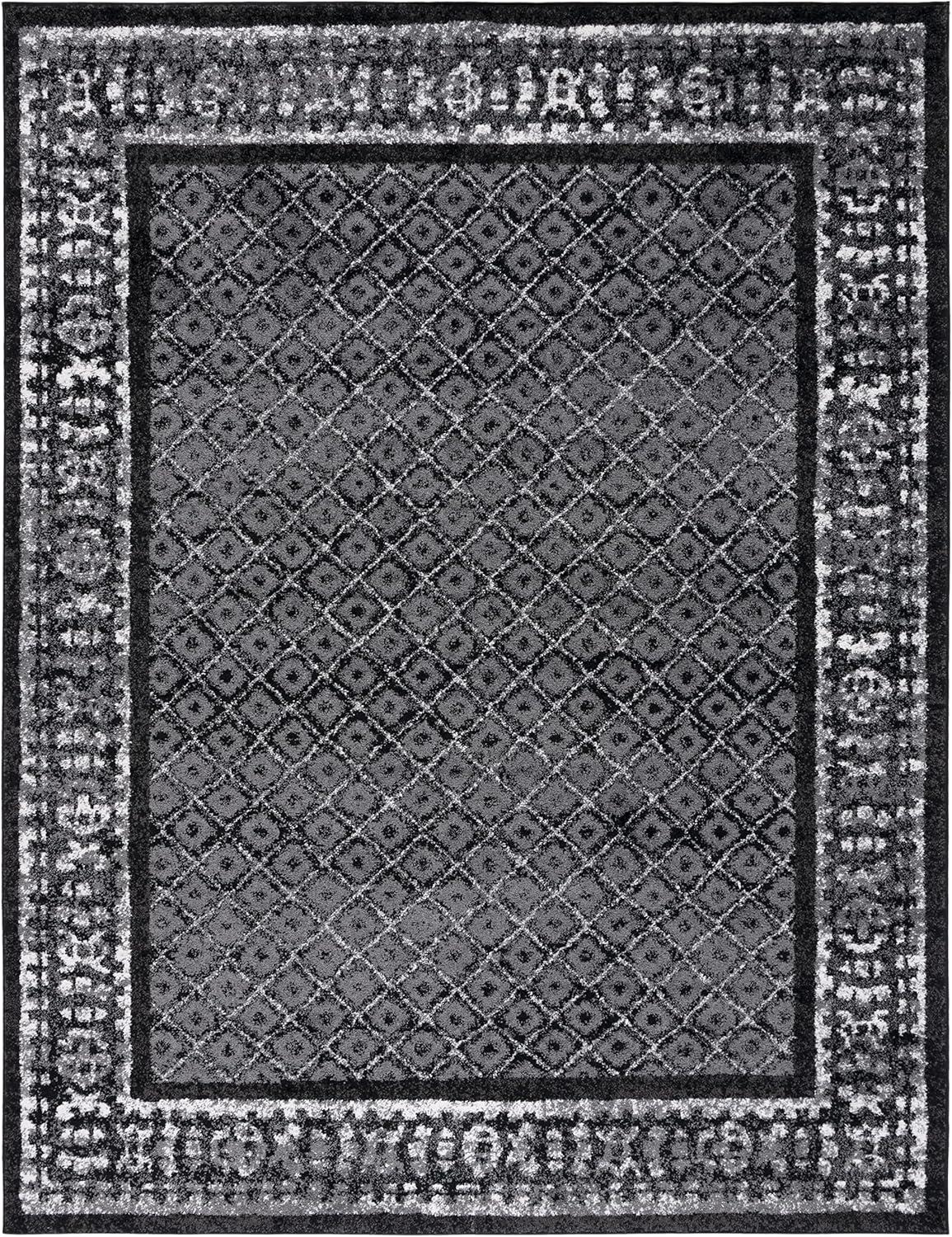 6' x 9' Black and Silver Synthetic Reversible Area Rug