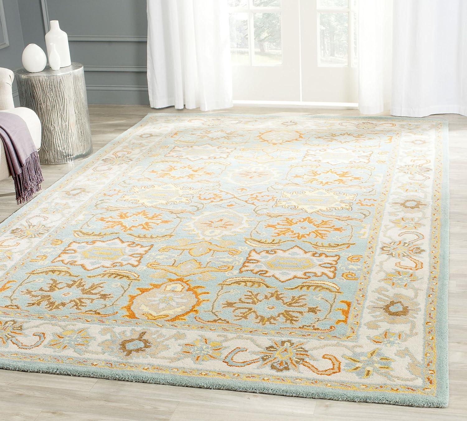 SAFAVIEH Heritage Giles Traditional Wool Area Rug, Light Blue/Ivory, 6' x 9'