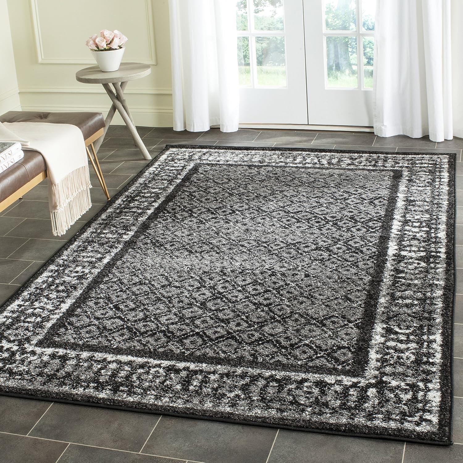 6' x 9' Black and Silver Synthetic Reversible Area Rug