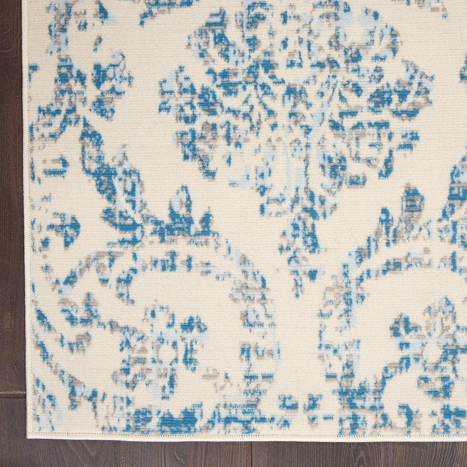 Elegant Ivory and Blue Damask 5' x 7' Synthetic Area Rug