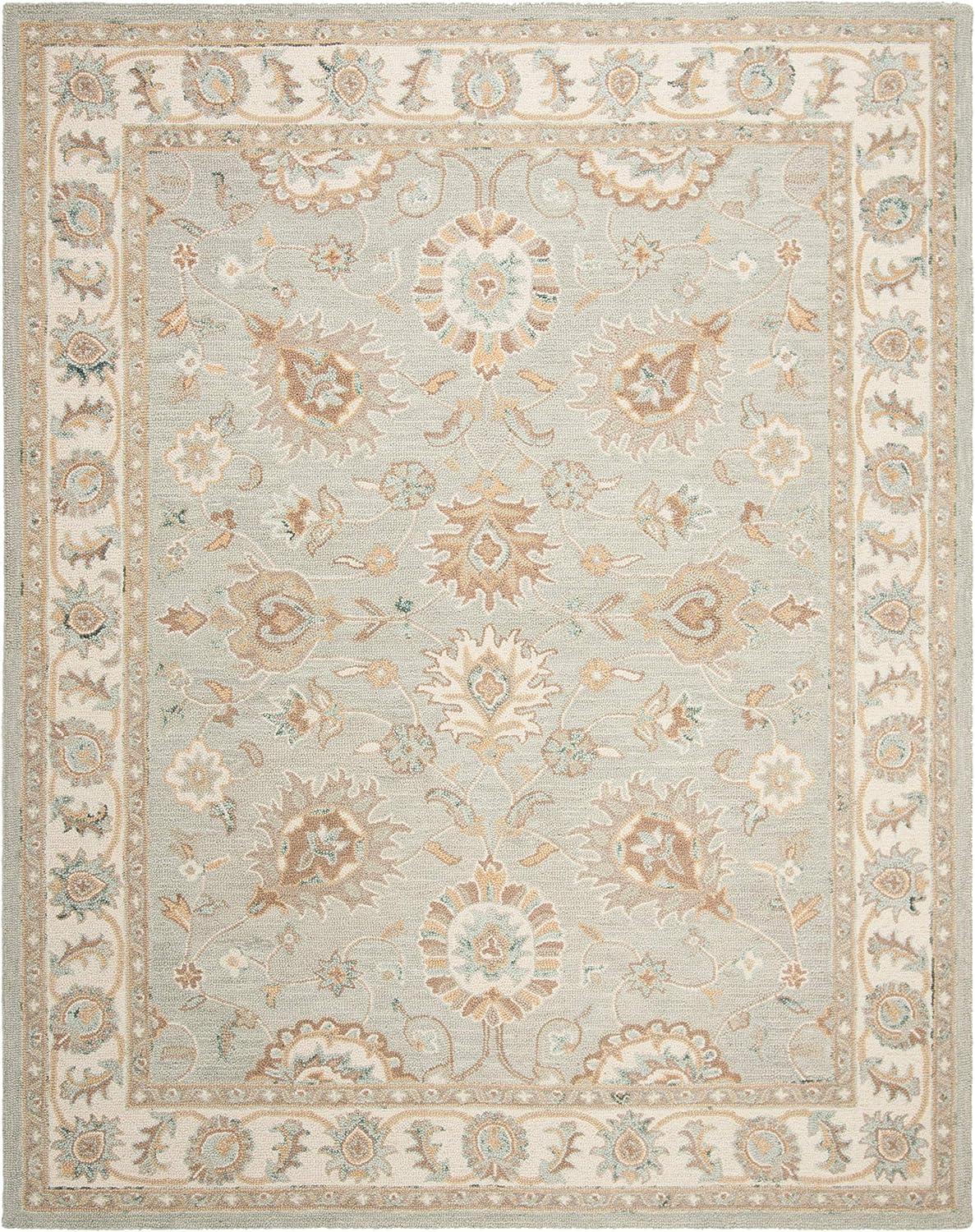 Handmade Ivory and Aqua Floral Wool Area Rug 5' x 8'