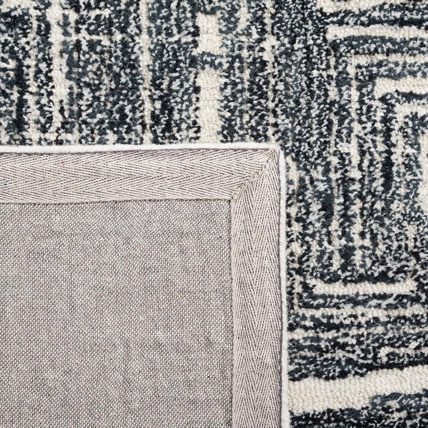Metro MET177 Hand Tufted Indoor Area Rug - Black/Ivory - 4'x6' - Safavieh