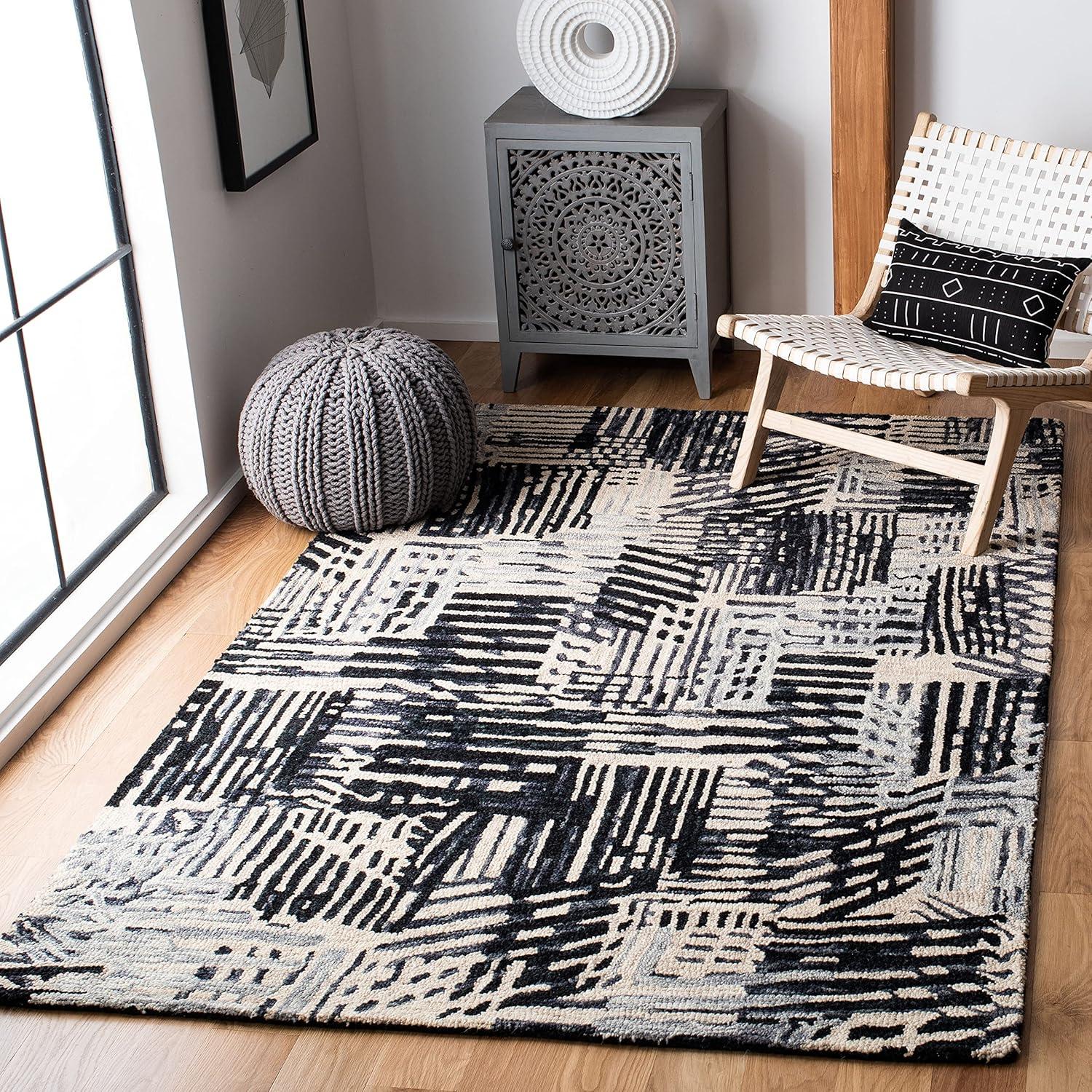 Handmade Black and Ivory Wool Abstract 4' x 6' Rug