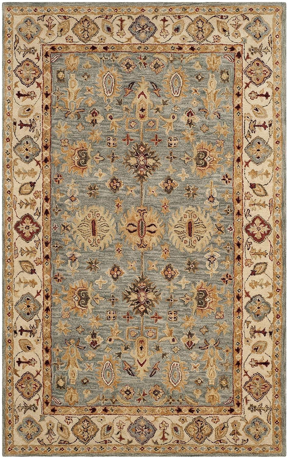 Antiquity AT847 Hand Tufted Area Rug - Blue/Ivory - 6'x9' - Safavieh.