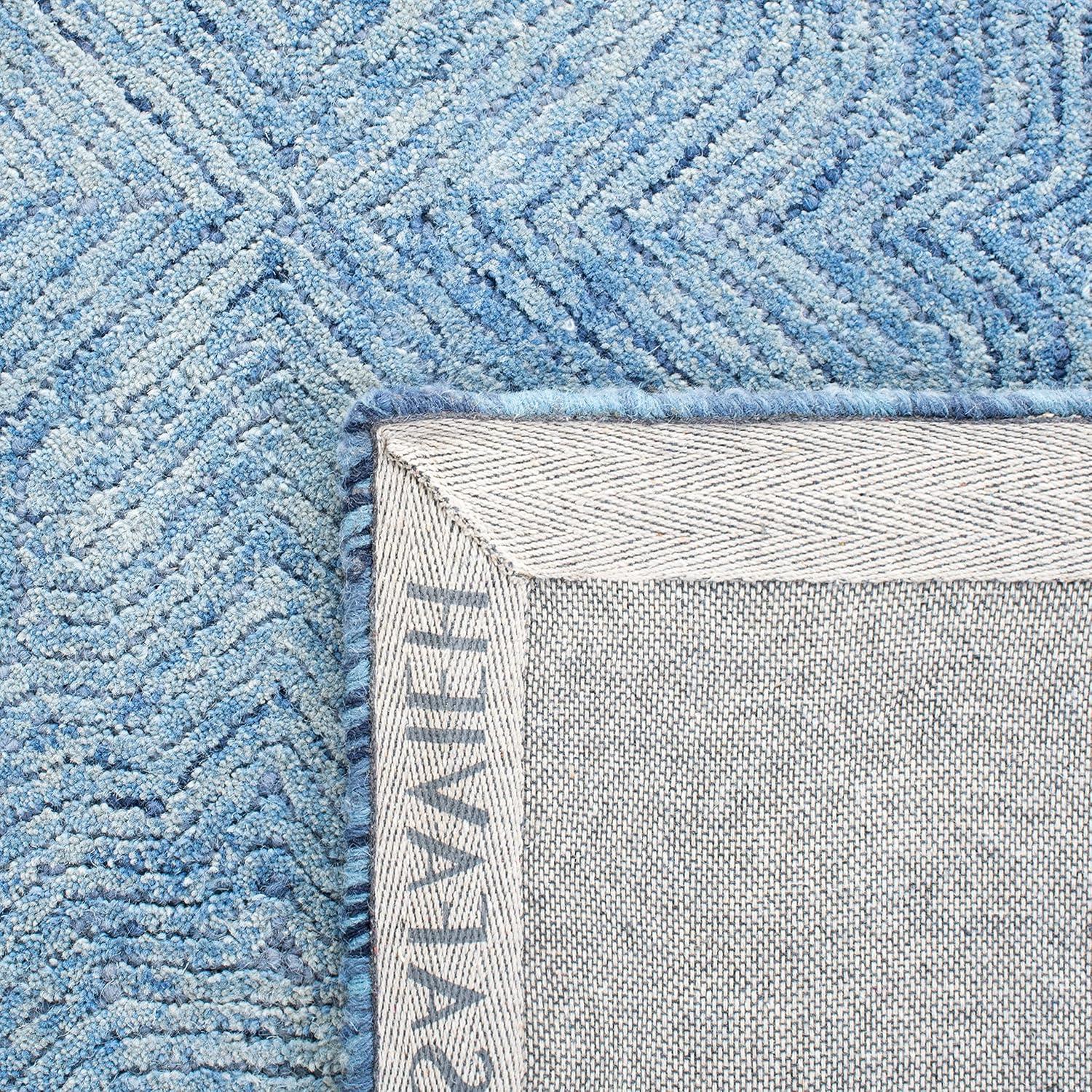Ikat IKT506 Hand Tufted Area Rug - Blue - 5'x8' - Safavieh