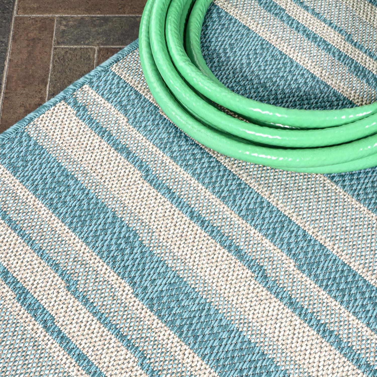 4' x 6' Castara Wavy Stripe Modern Indoor/Outdoor Area Rug, Aqua/Cream - JONATHAN Y