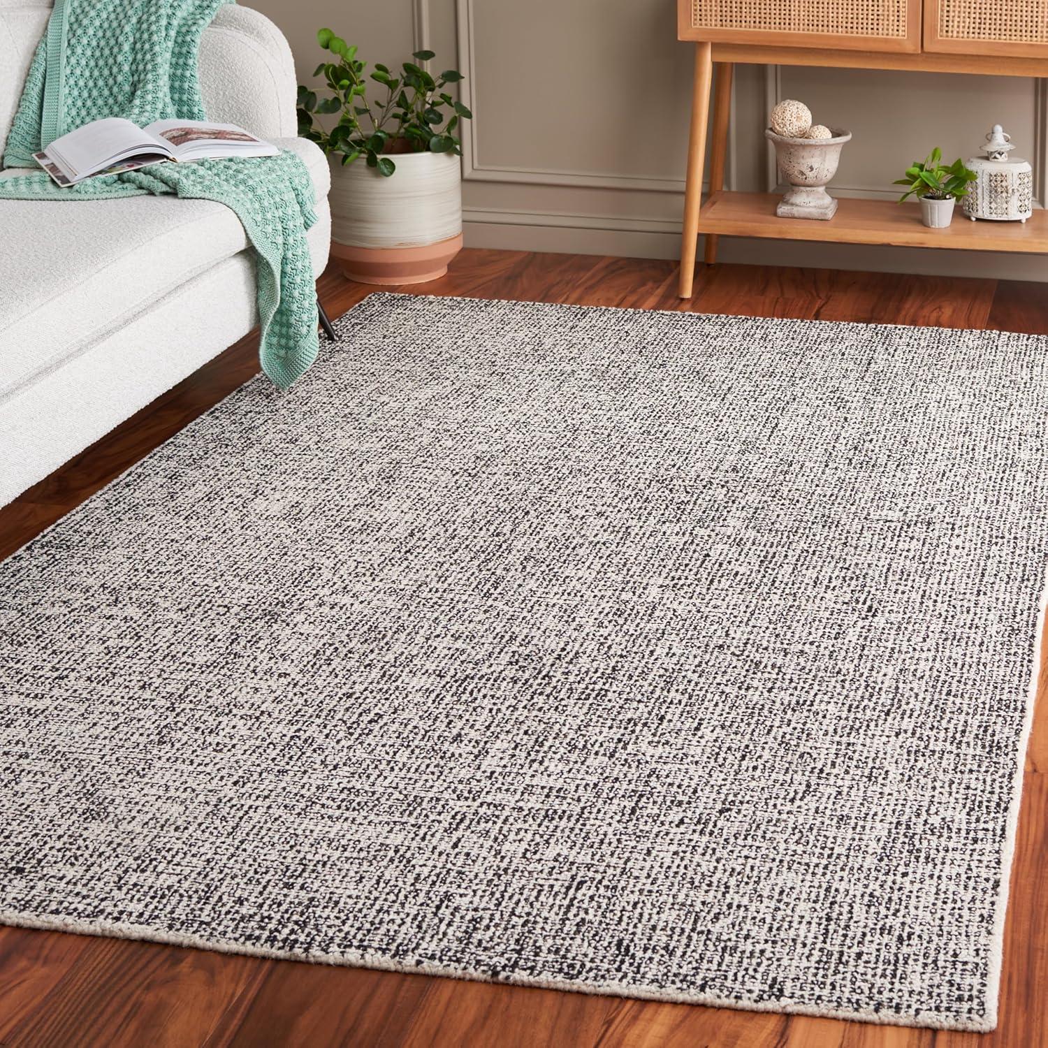 Ebony EBN602 Hand Tufted Area Rug  - Safavieh