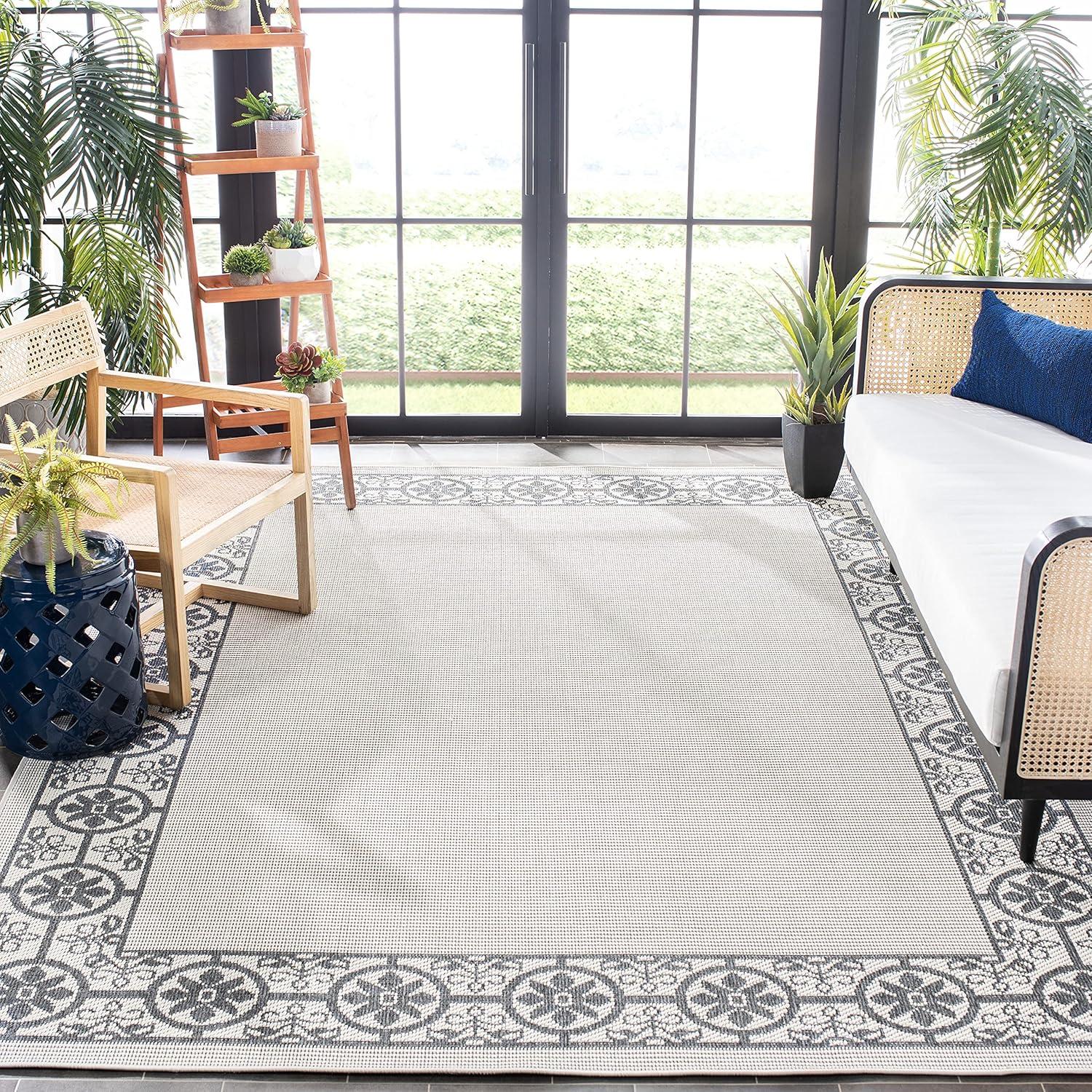 Ivory & Charcoal Geometric 8' x 10' Easy-Care Synthetic Area Rug