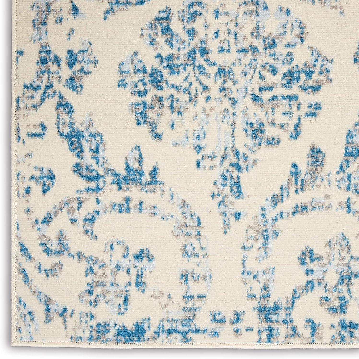 Elegant Ivory and Blue Damask 5' x 7' Synthetic Area Rug