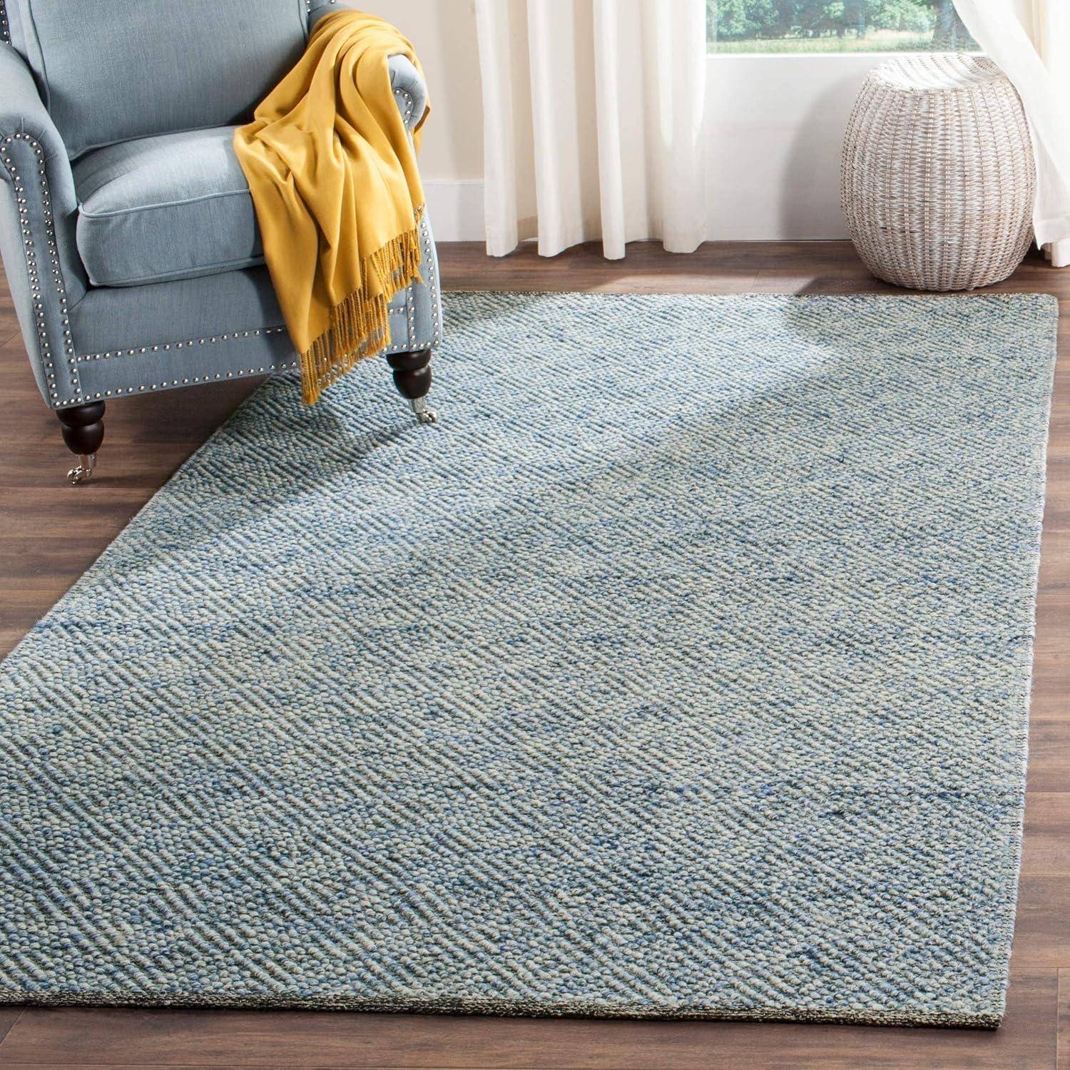 Hand-Tufted Coastal Charm Blue Wool 4' x 6' Braided Area Rug