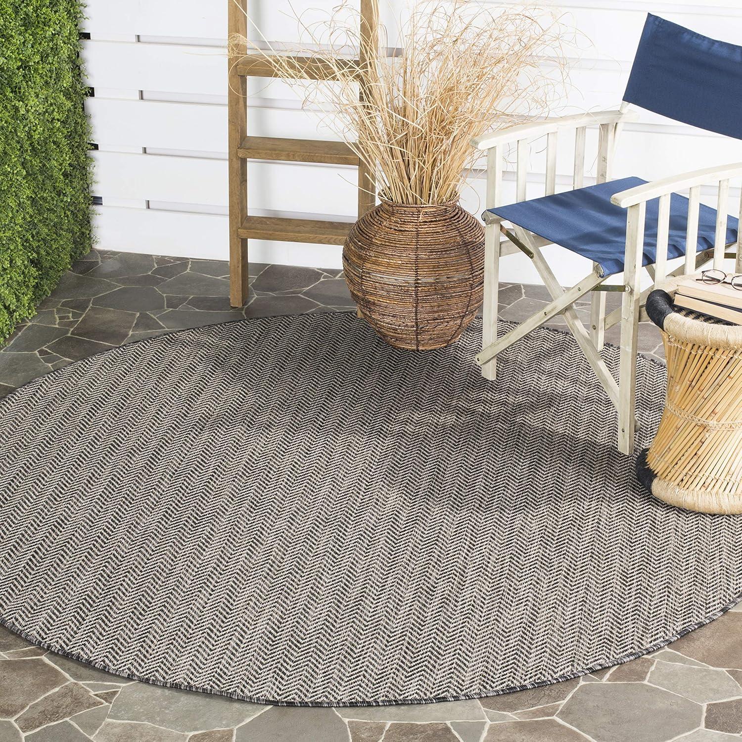 Carolann Easy-Care Black/Beige Synthetic Round Area Rug, 5'3"