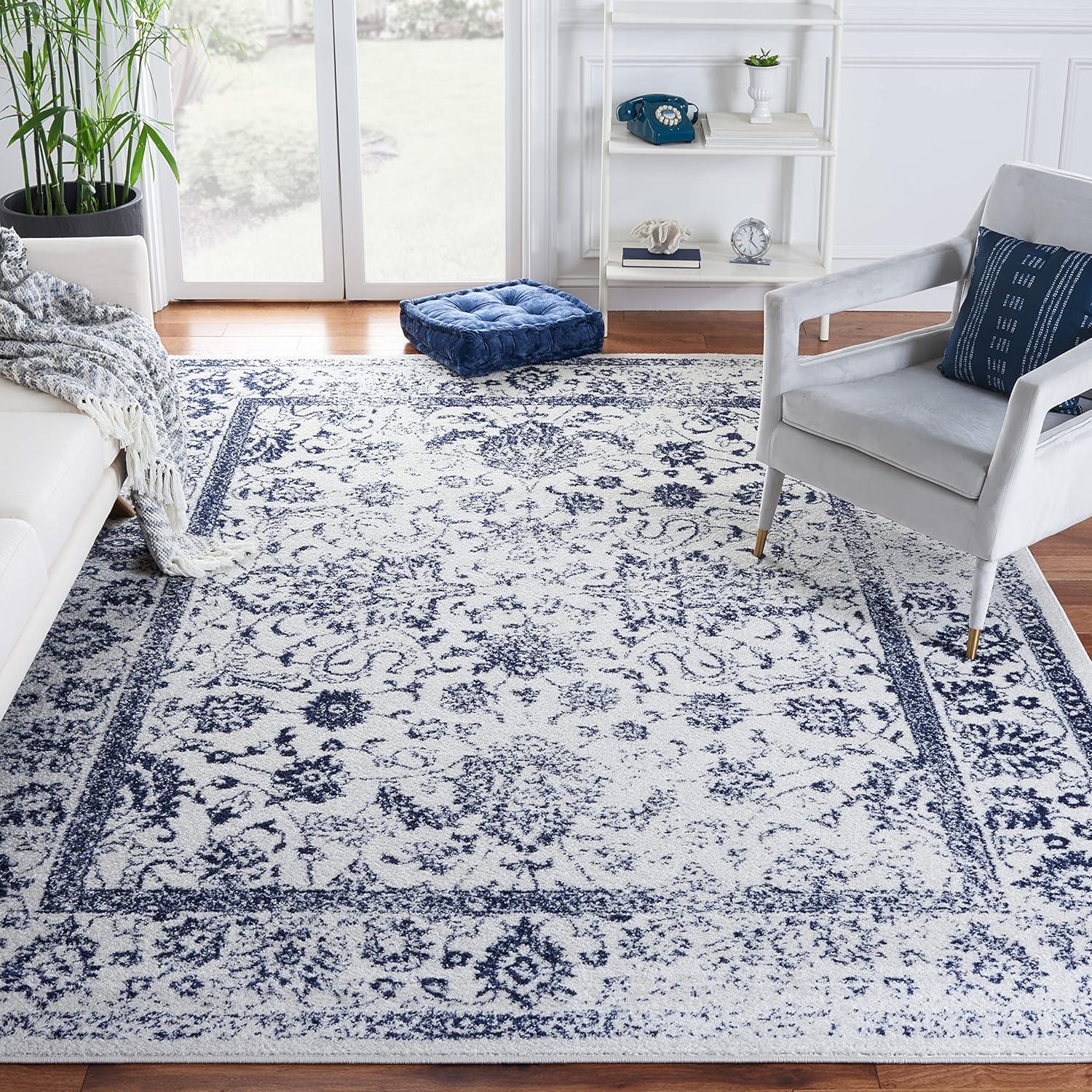 SAFAVIEH Adirondack Wyatt Distressed Area Rug, Ivory/Navy, 11' x 15'