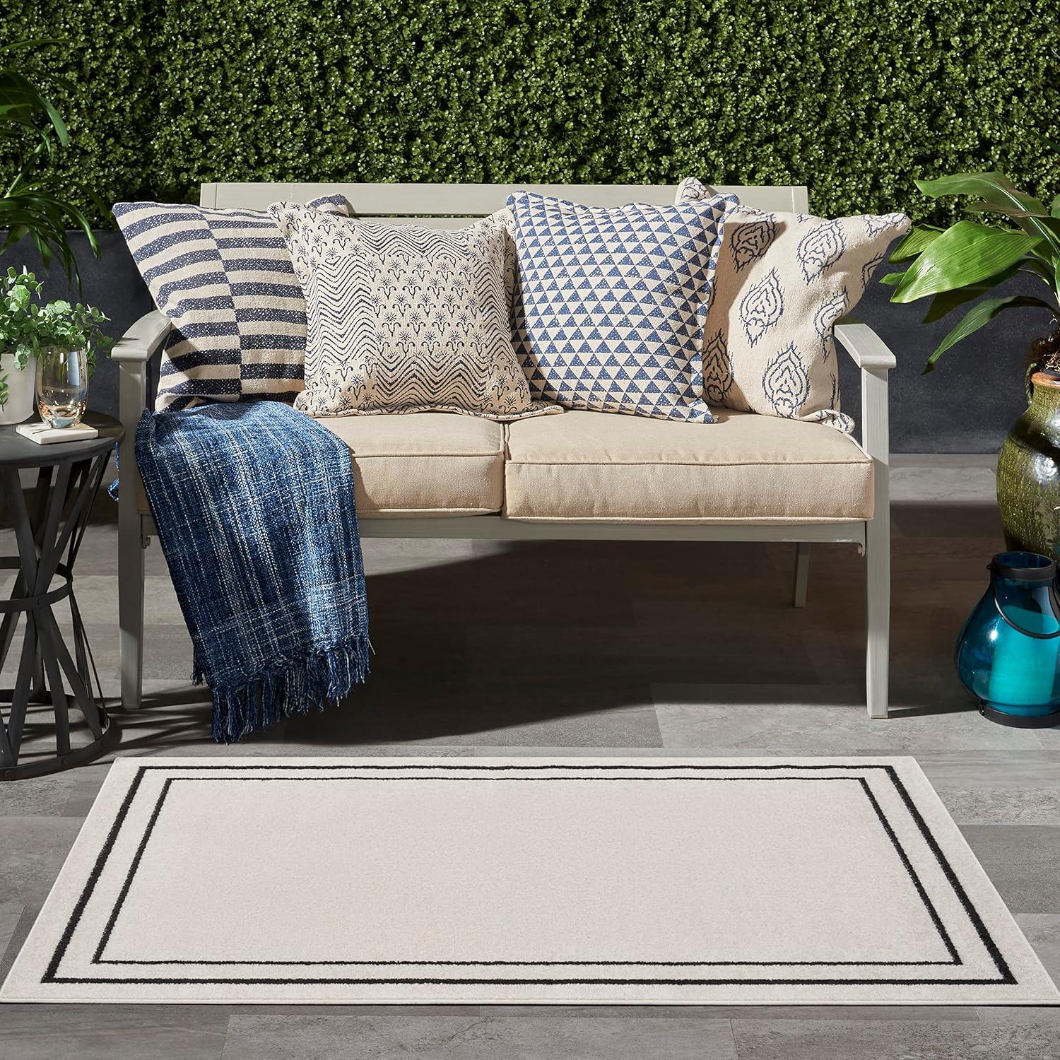 Nourison Essentials 2' x 4' Ivory/Black Contemporary Indoor/Outdoor Rug