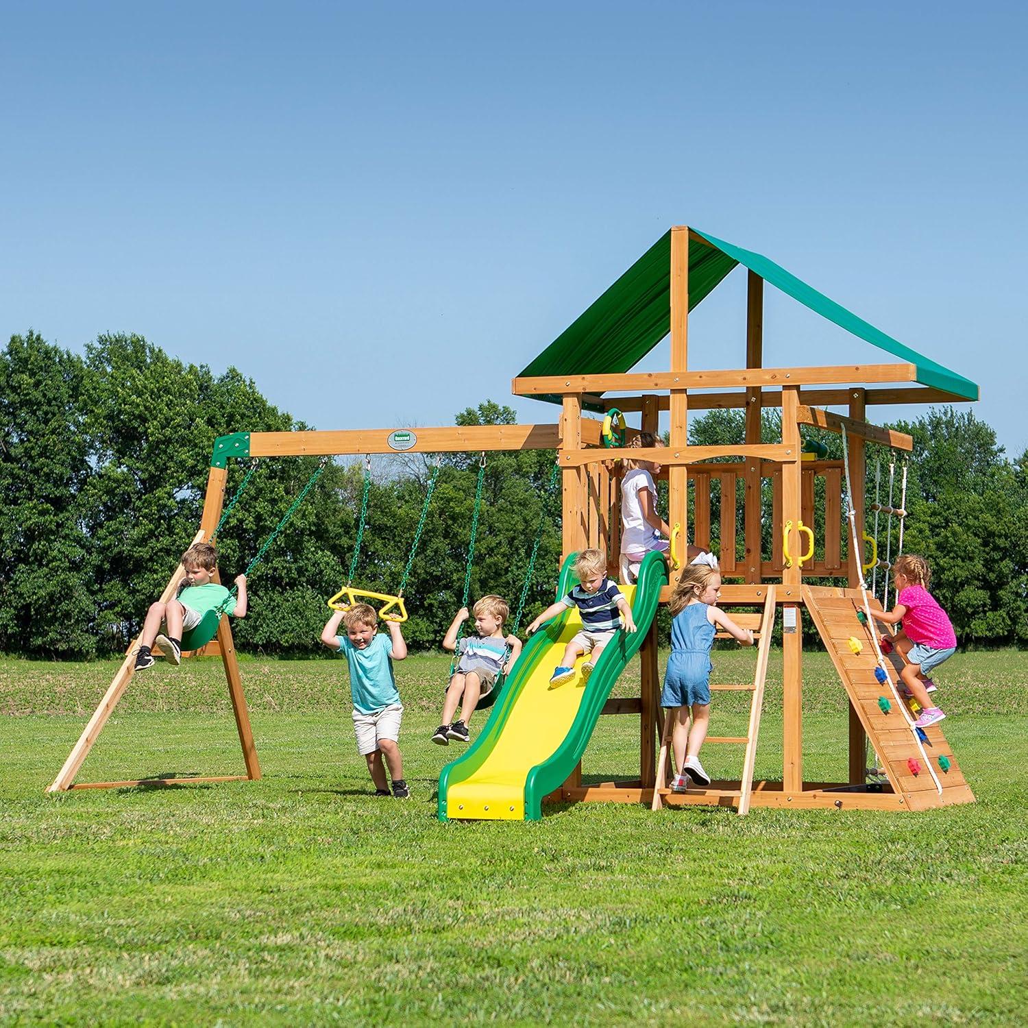 Backyard Discovery Backyard Discovery Mount Mckinley Cedar Wood Swing Set with Wave Slide, Play Deck, Double Rock Wall, and Rope Ladder
