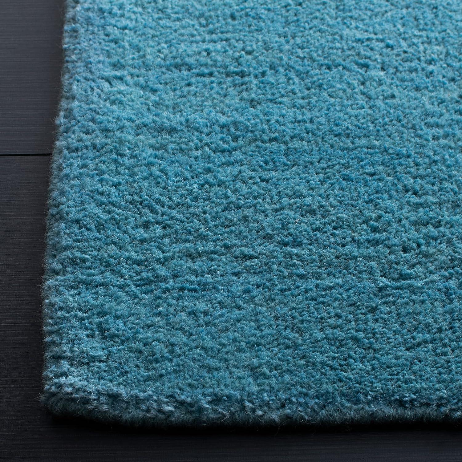 Moreau Handmade Tufted Wool Turquoise Area Rug