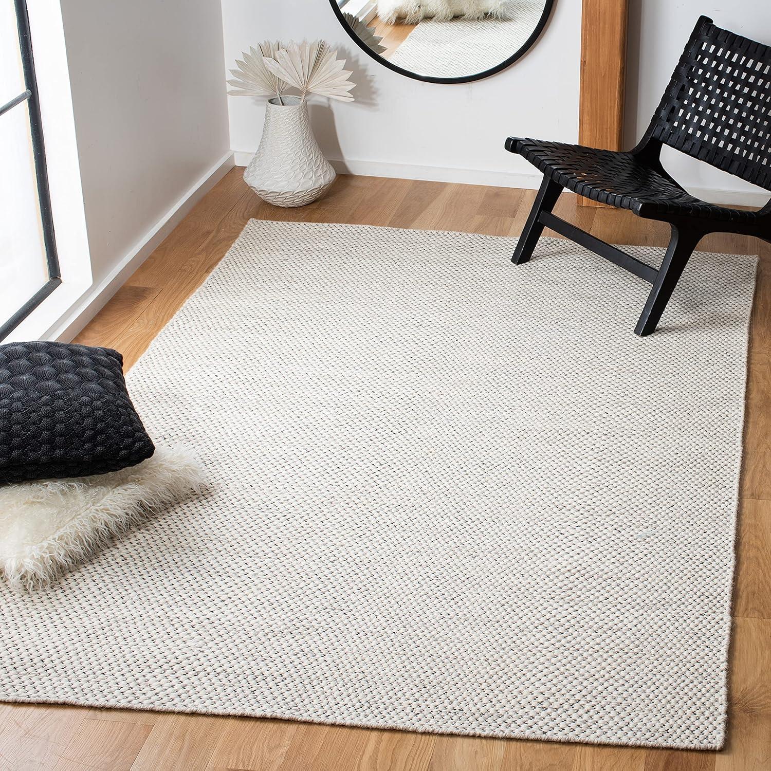 Ivory Flat Woven Wool 6' x 9' Area Rug