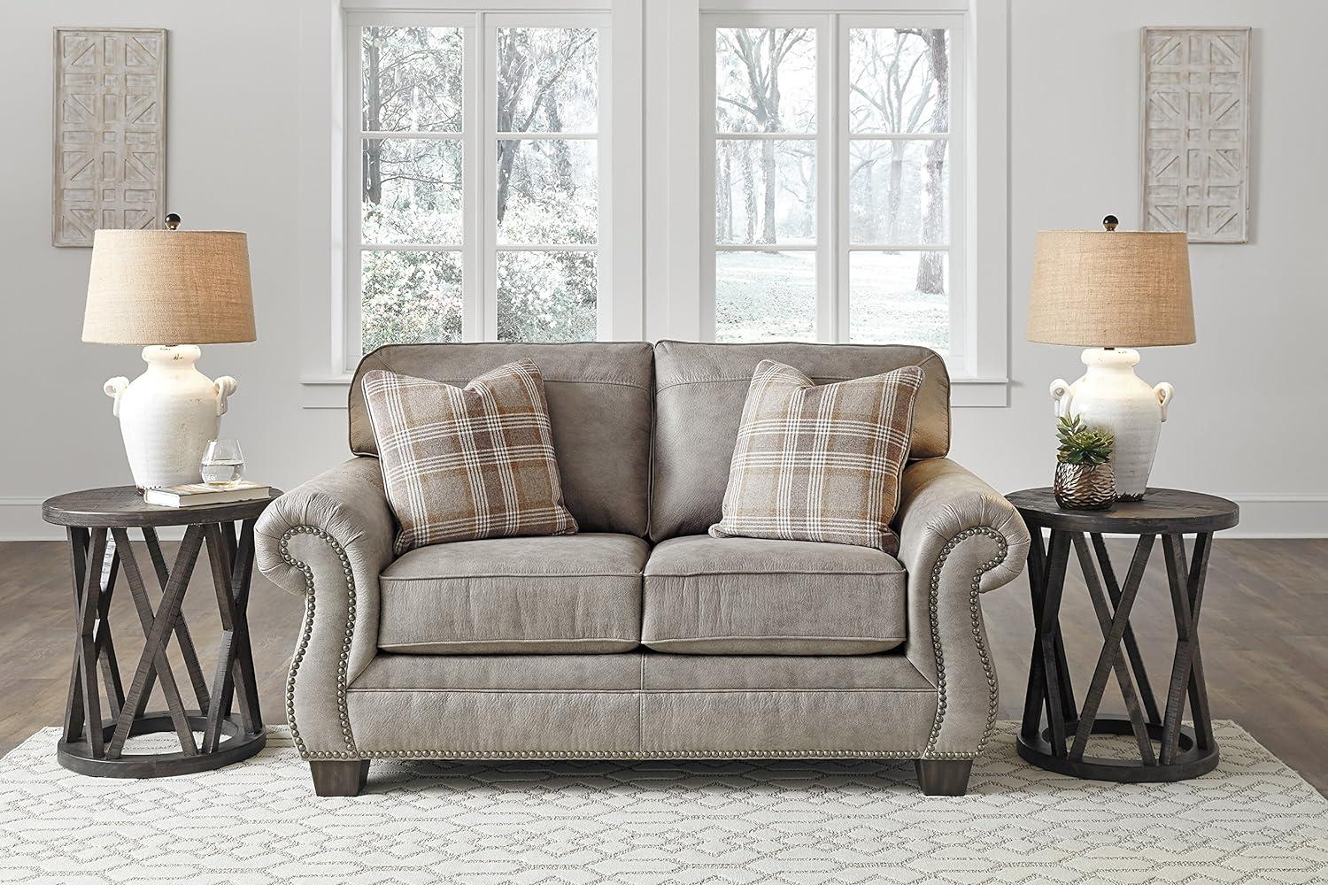 Elegant Gray Faux Leather Loveseat with Nailhead Trim & Plaid Pillows