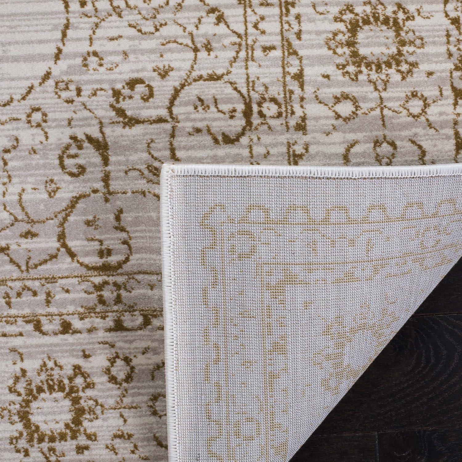 Elegant Cream and Gold Viscose 5'1" x 7'6" Traditional Area Rug