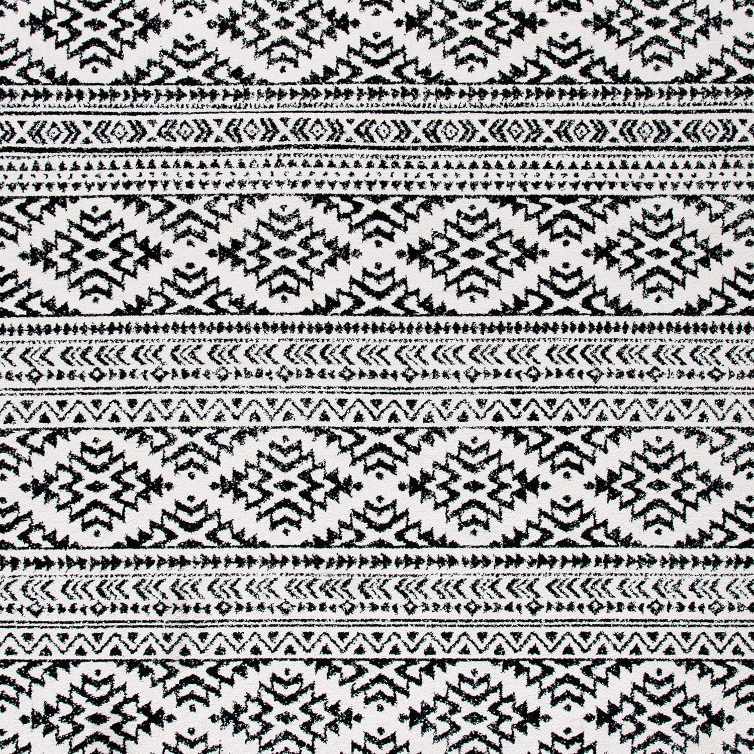 SAFAVIEH Tulum Lakisha Distressed Southwestern Area Rug, 9' x 12', Ivory/Black